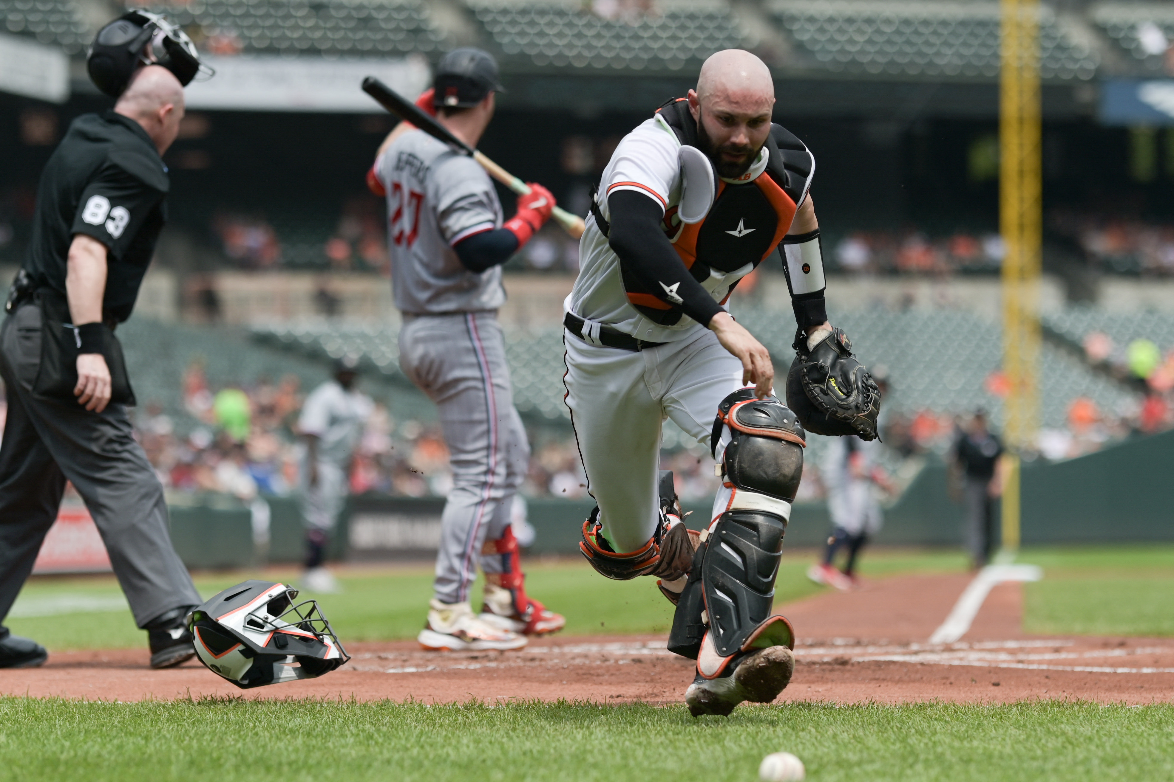 Orioles benefit from late rally to top Twins, end skid