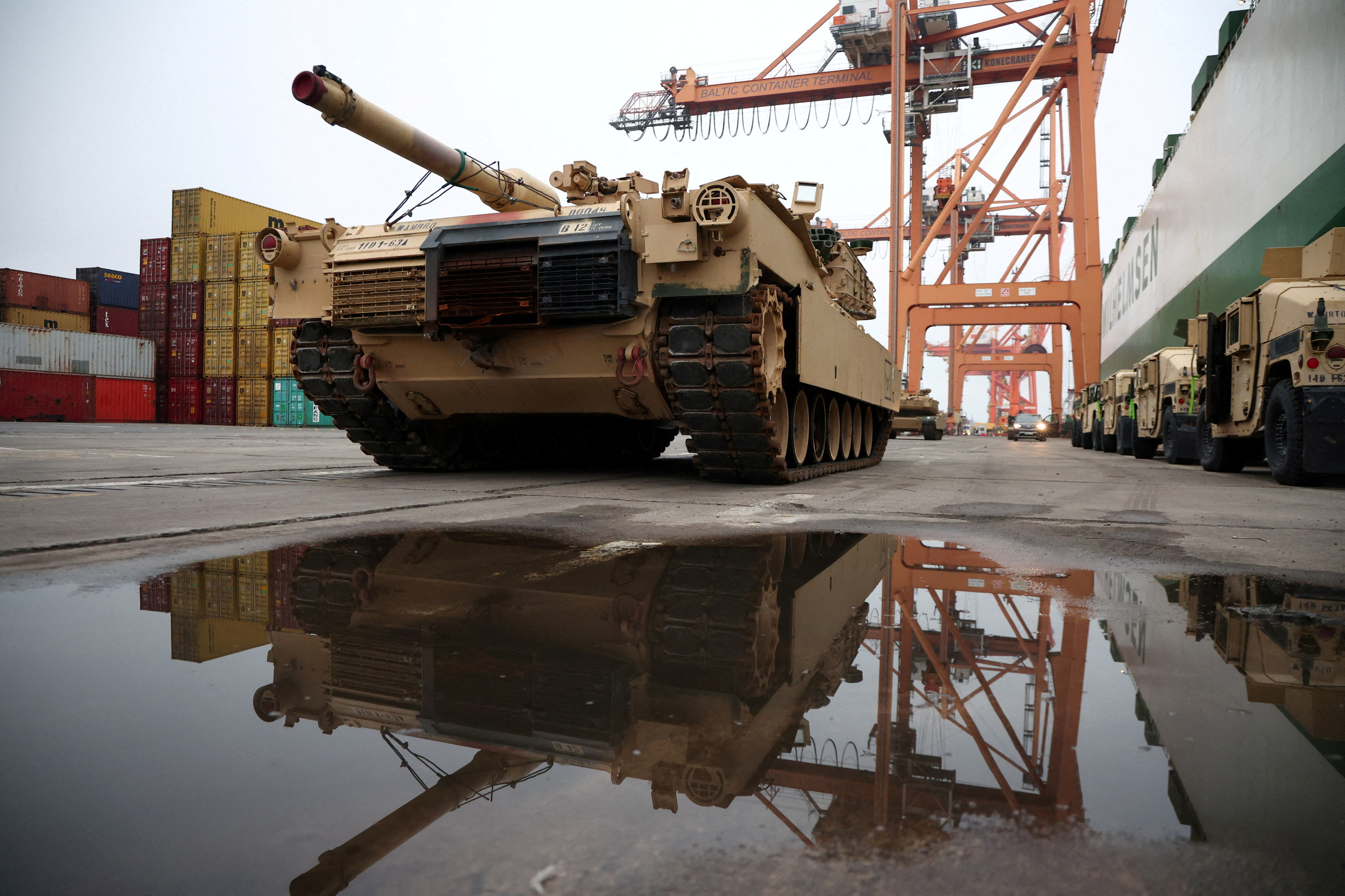 Abrams tank from U.S. 2nd Armored Brigade Combat Team (ABCT) military equipment is unloaded in the Polish port of Gdynia