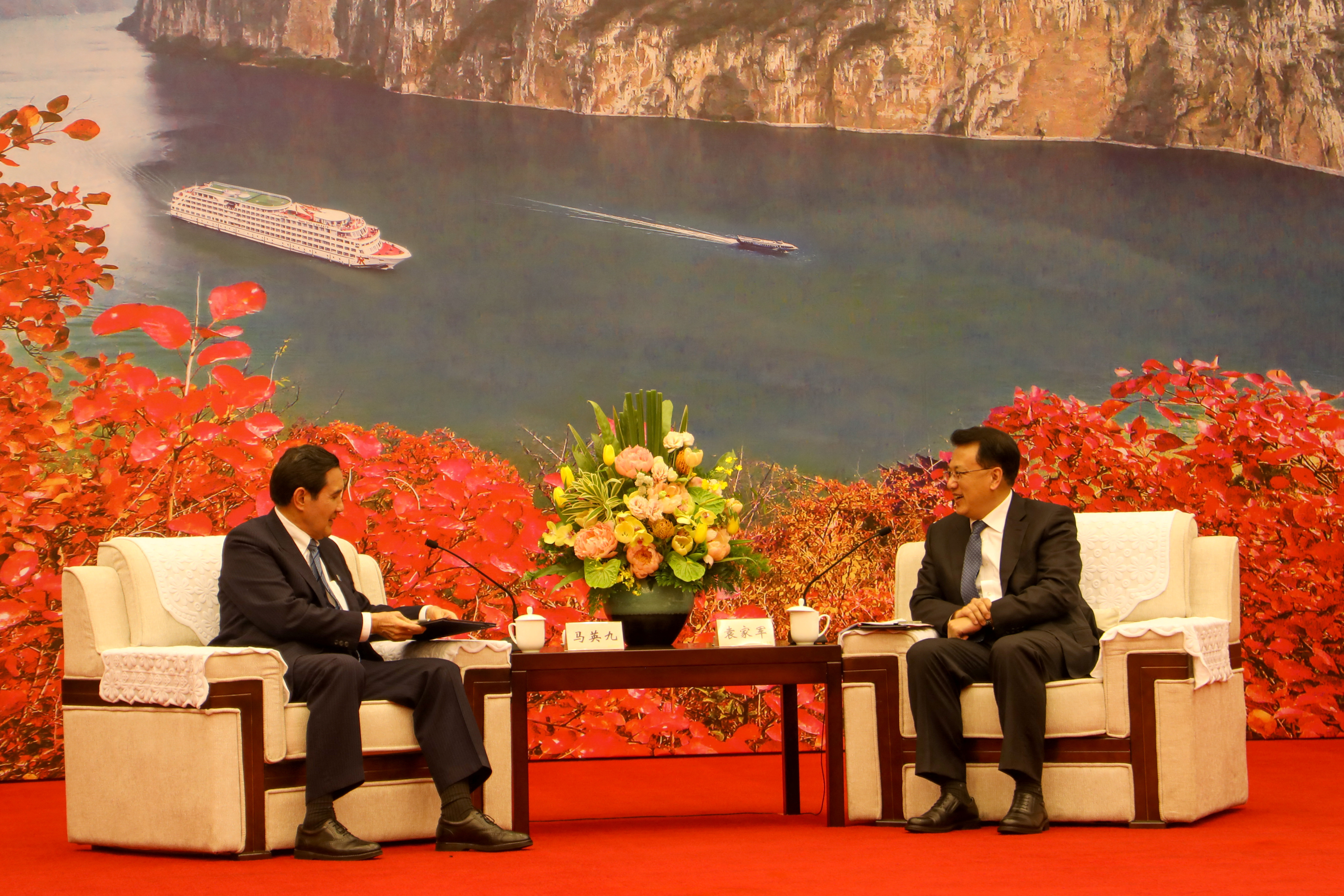 Handout picture of Former Taiwanese president Ma Ying-jeou meets China's Communist Party Secretary of Chongqing Yuan Jiajun in Chongqing