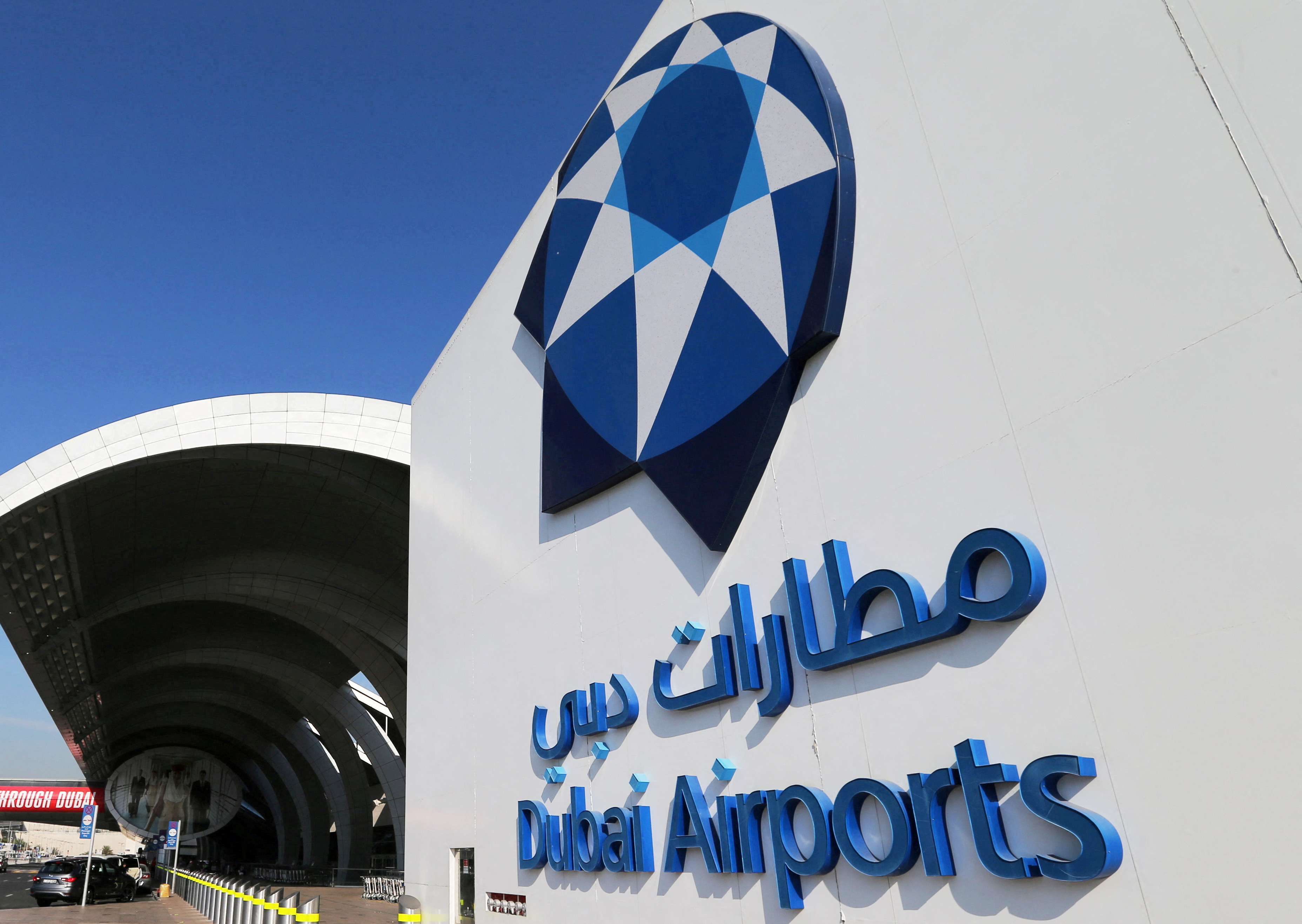 FILE PHOTO: The corporate logo of Dubai Airports is seen at terminal three of Dubai Airport