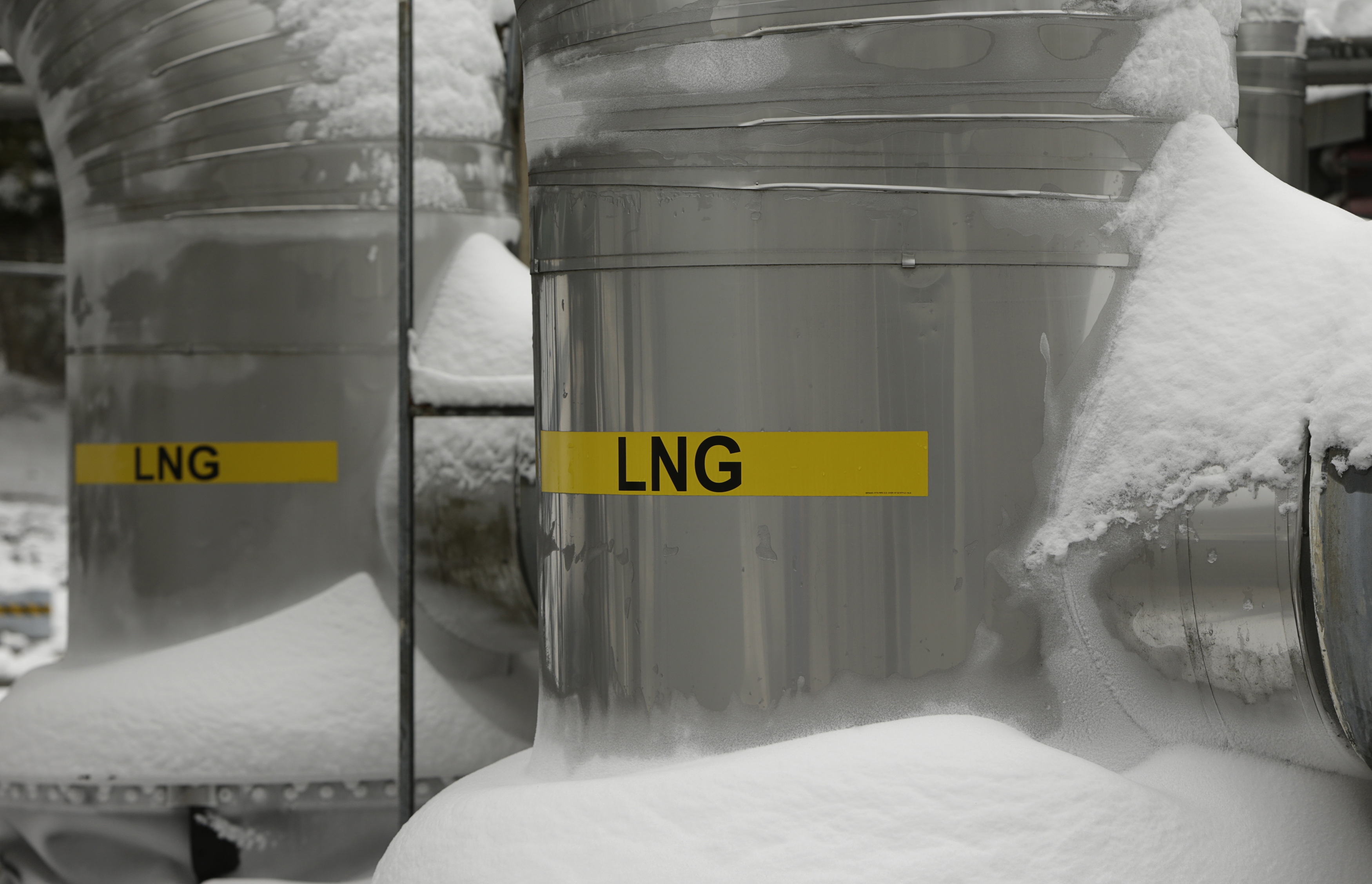 Snow covered transfer lines are seen at the Dominion Cove Point Liquefied Natural Gas terminal in Maryland