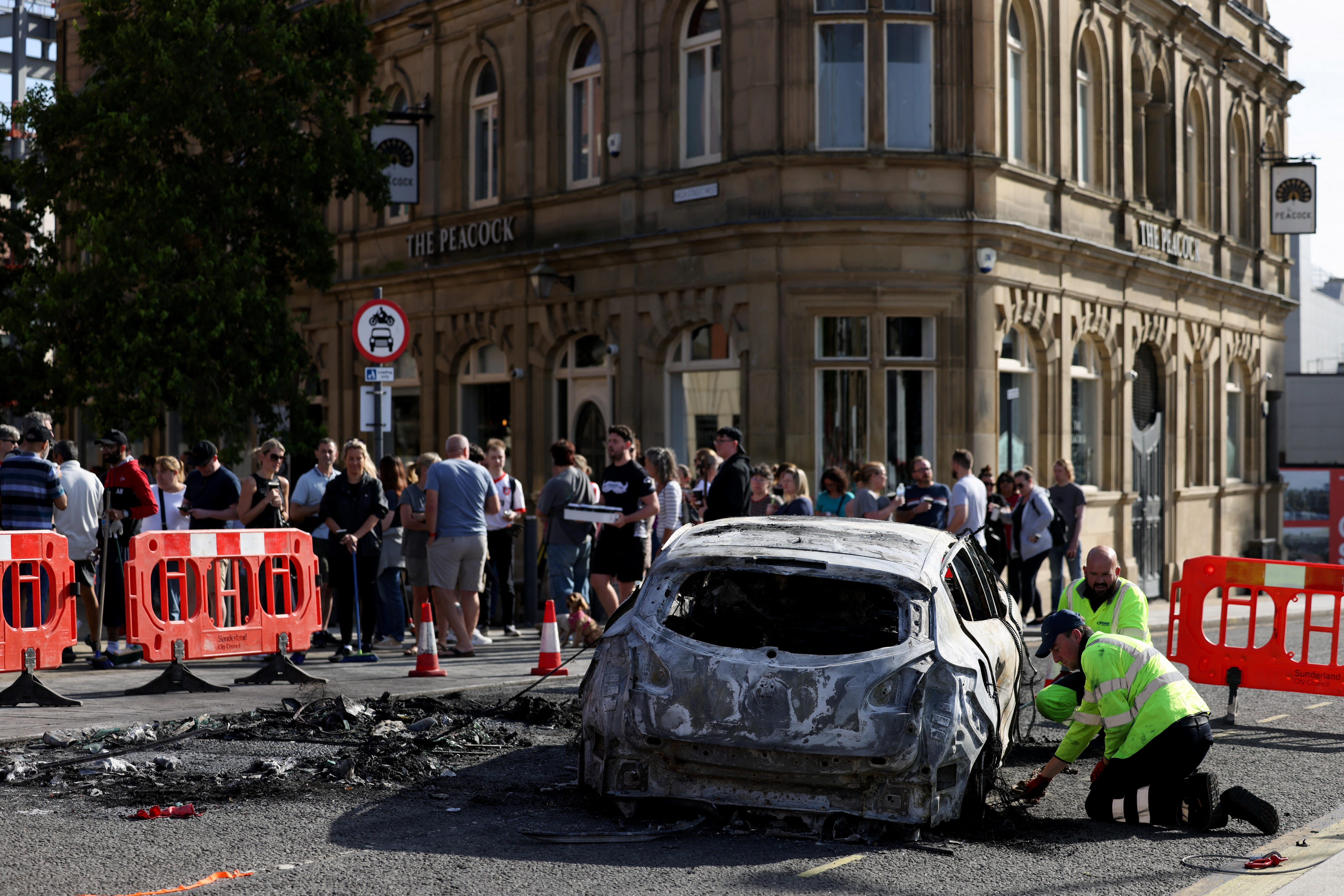 Cleanup after a night of violent anti-immigration demonstrations in Sunderland