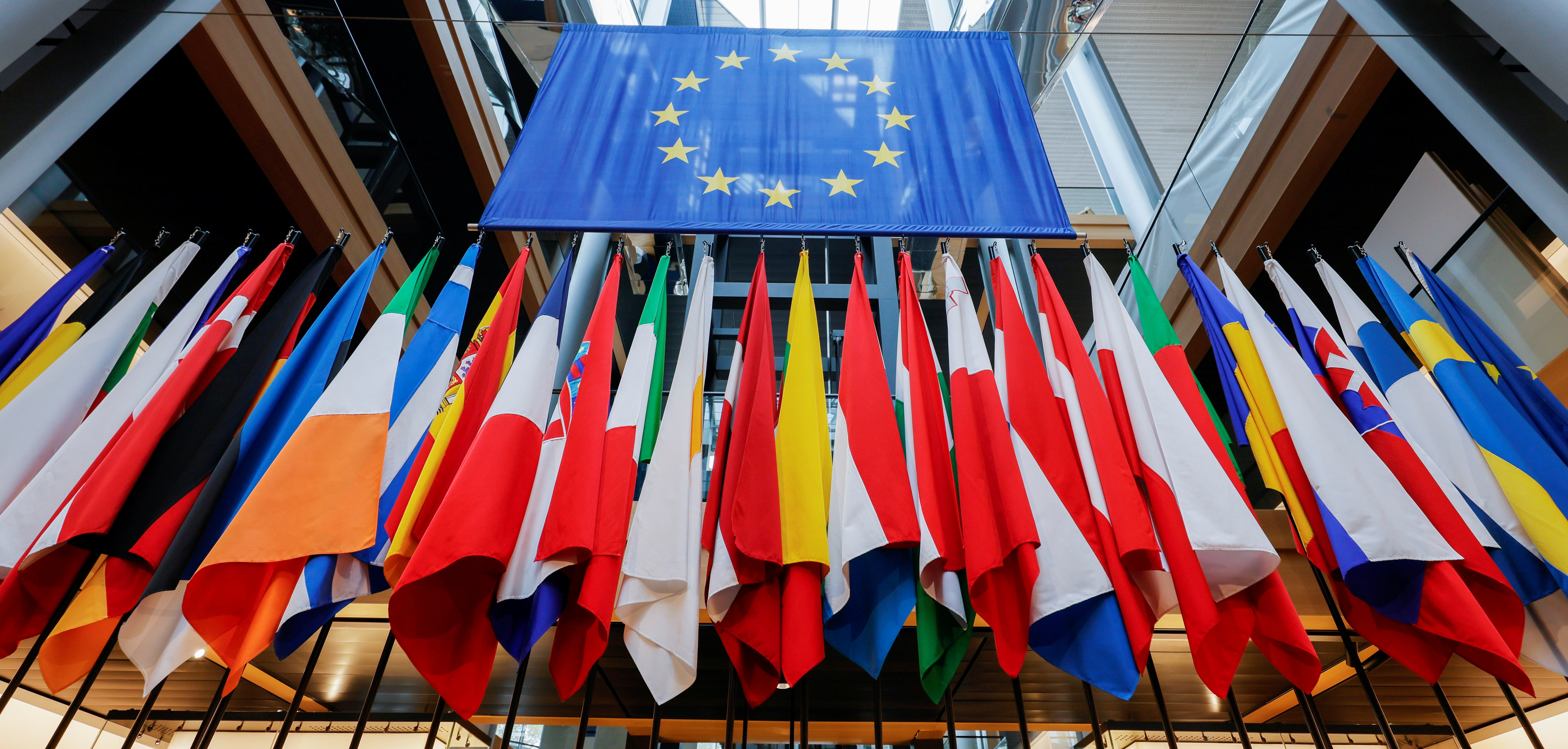 A view of different flags of the European Union Members during a debate on Poland's challenge to the supremacy of EU laws at the European Parliament, in Strasbourg, France, October 19, 2021. Ronald Wittek/Pool via REUTERS