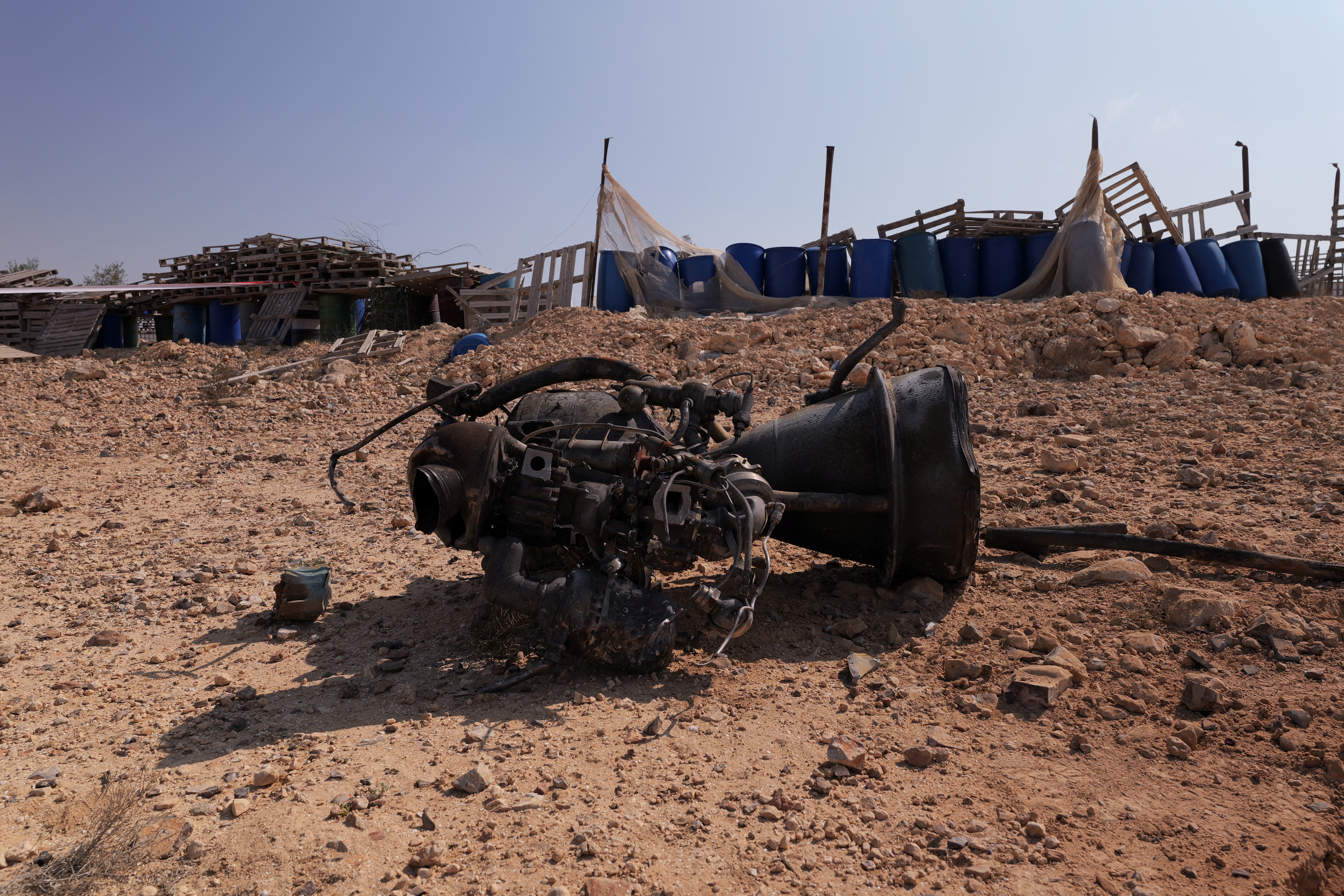The remains of a rocket booster that, according to Israeli authorities critically injured a 7-year-old girl, after Iran launched drones and missiles towards Israel, near Arad