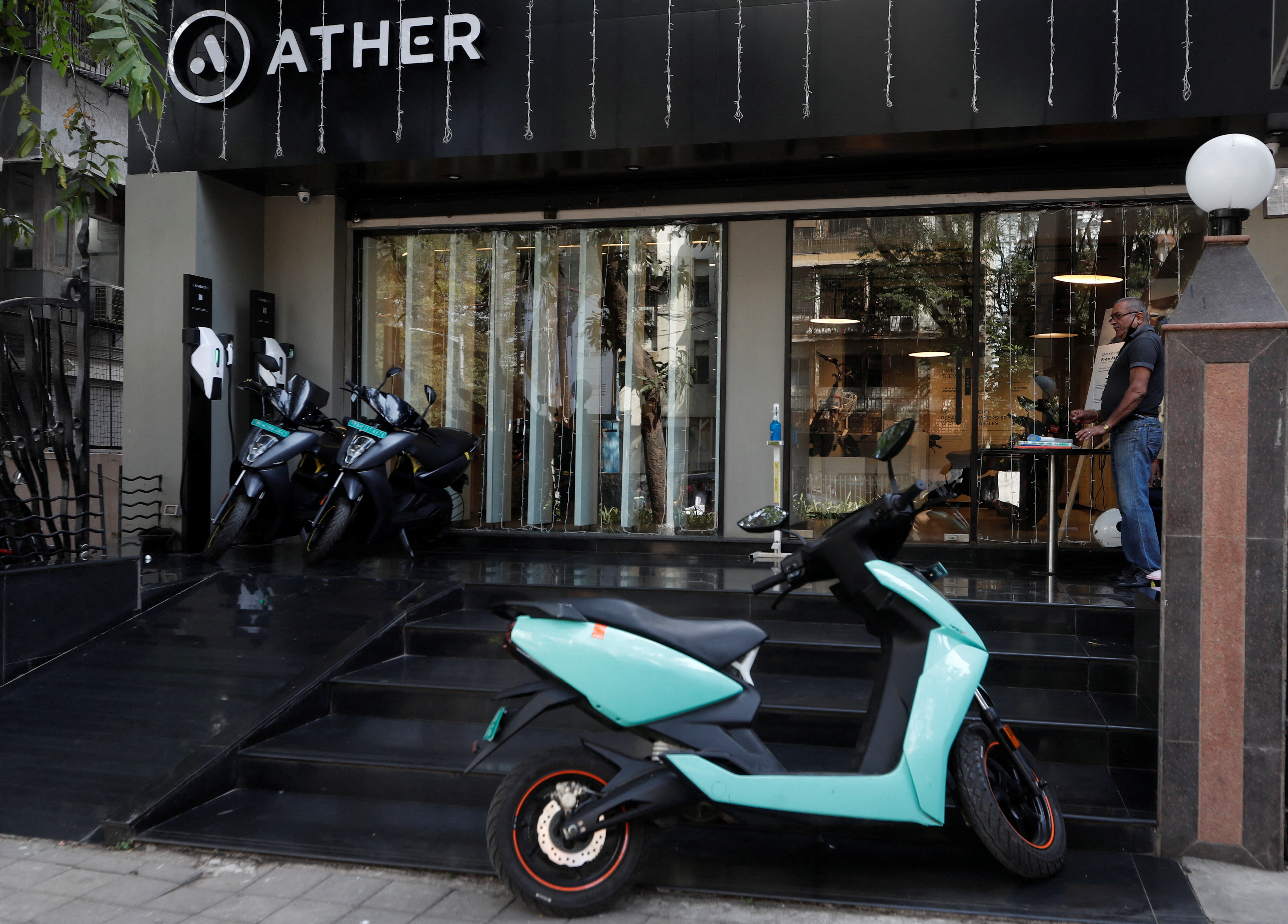 Ather electric scooters are seen outside the showroom in Mumbai