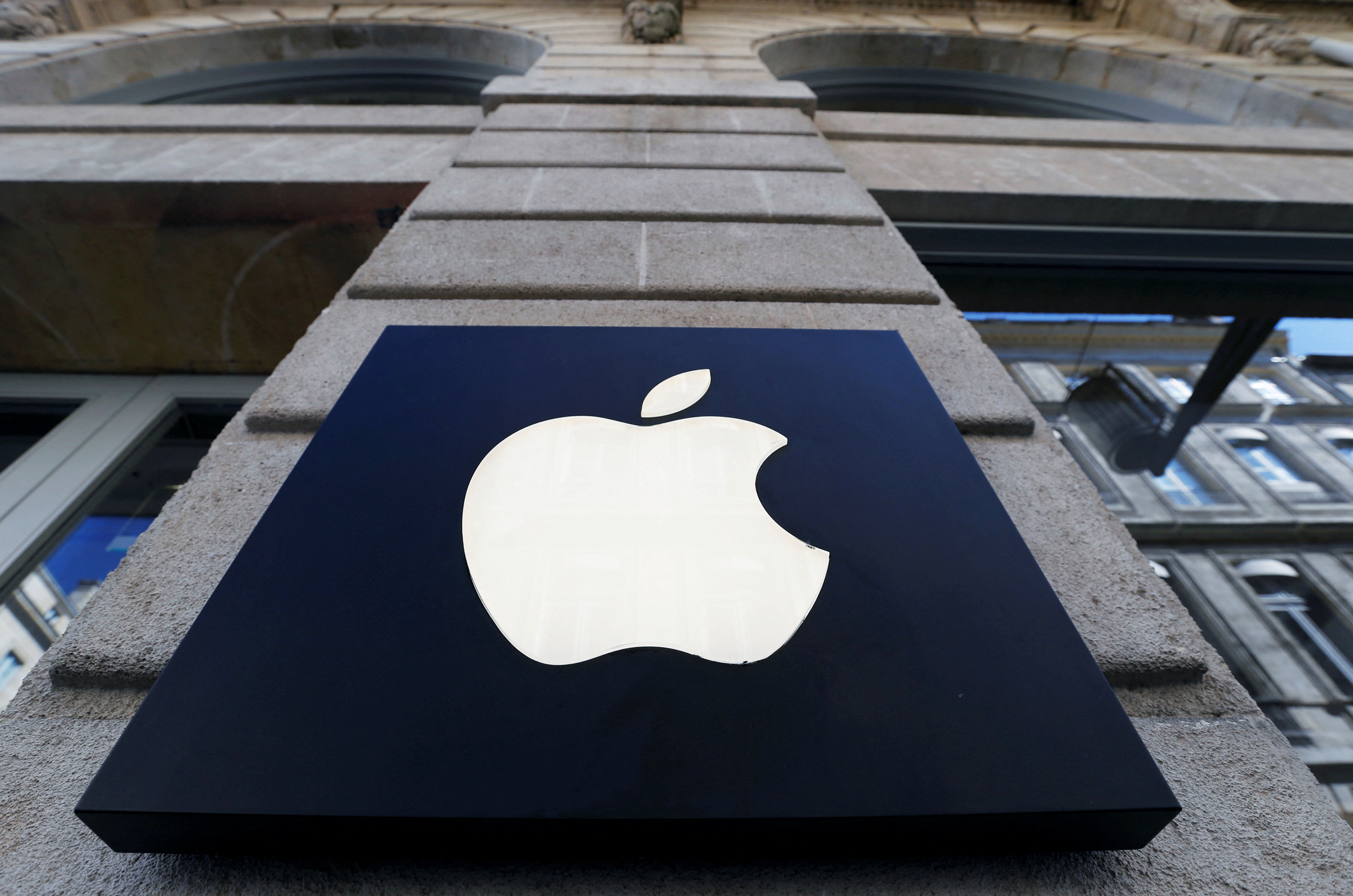 The logo of the Apple company is seen outside the Apple store in Bordeaux