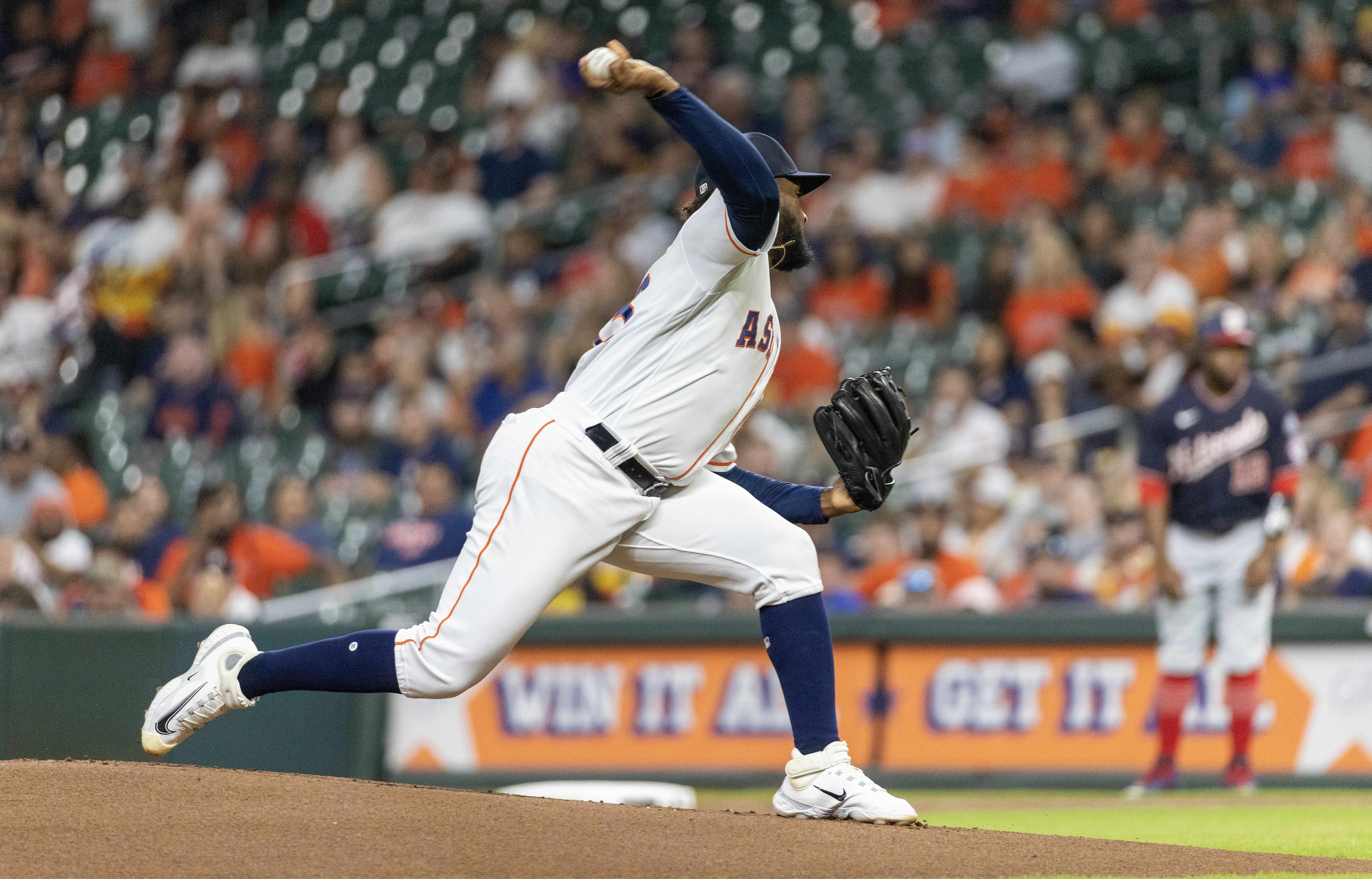 Ruiz gets 2 big hits late as the Nationals beat the Astros 4-1 in 10  innings to avoid a sweep