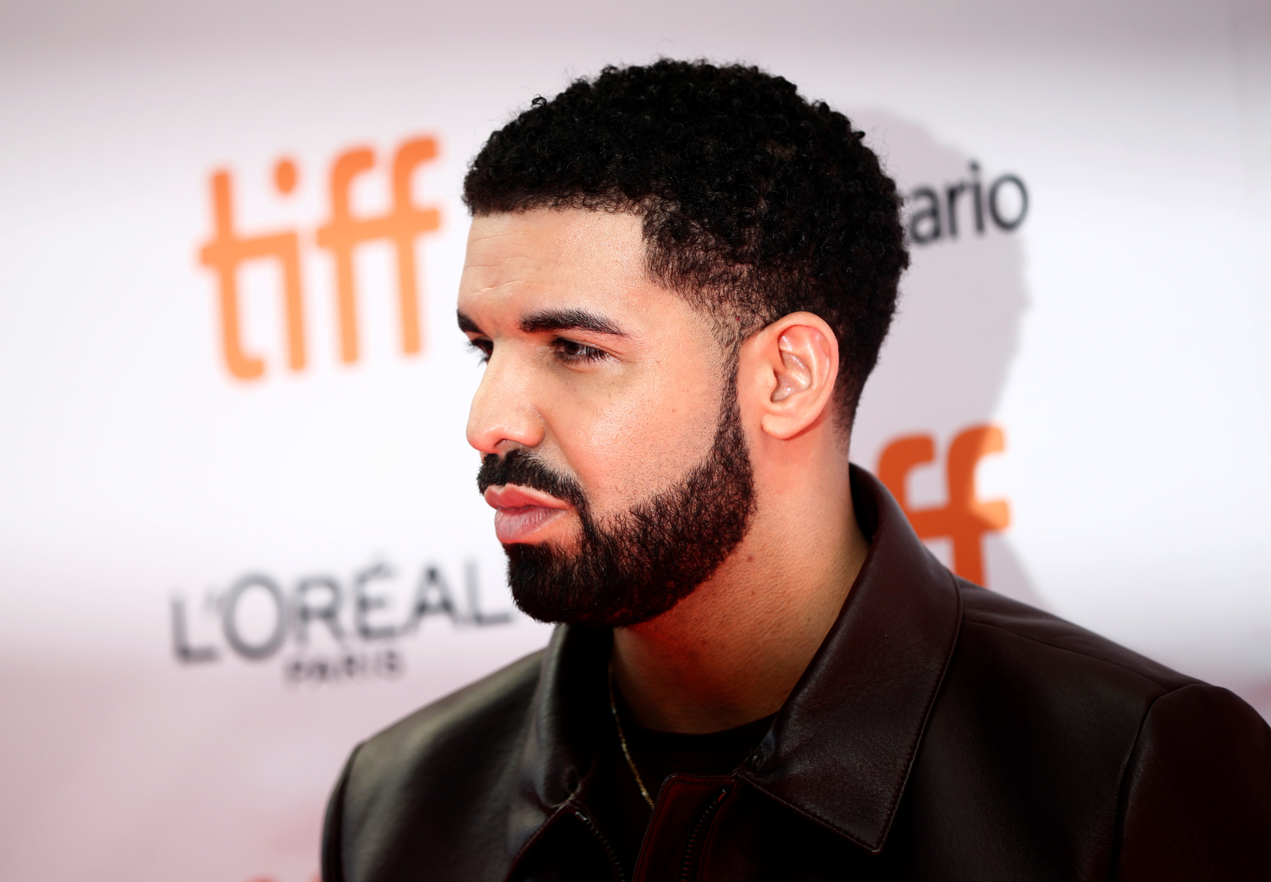 Drake arrives on the red carpet for the film 