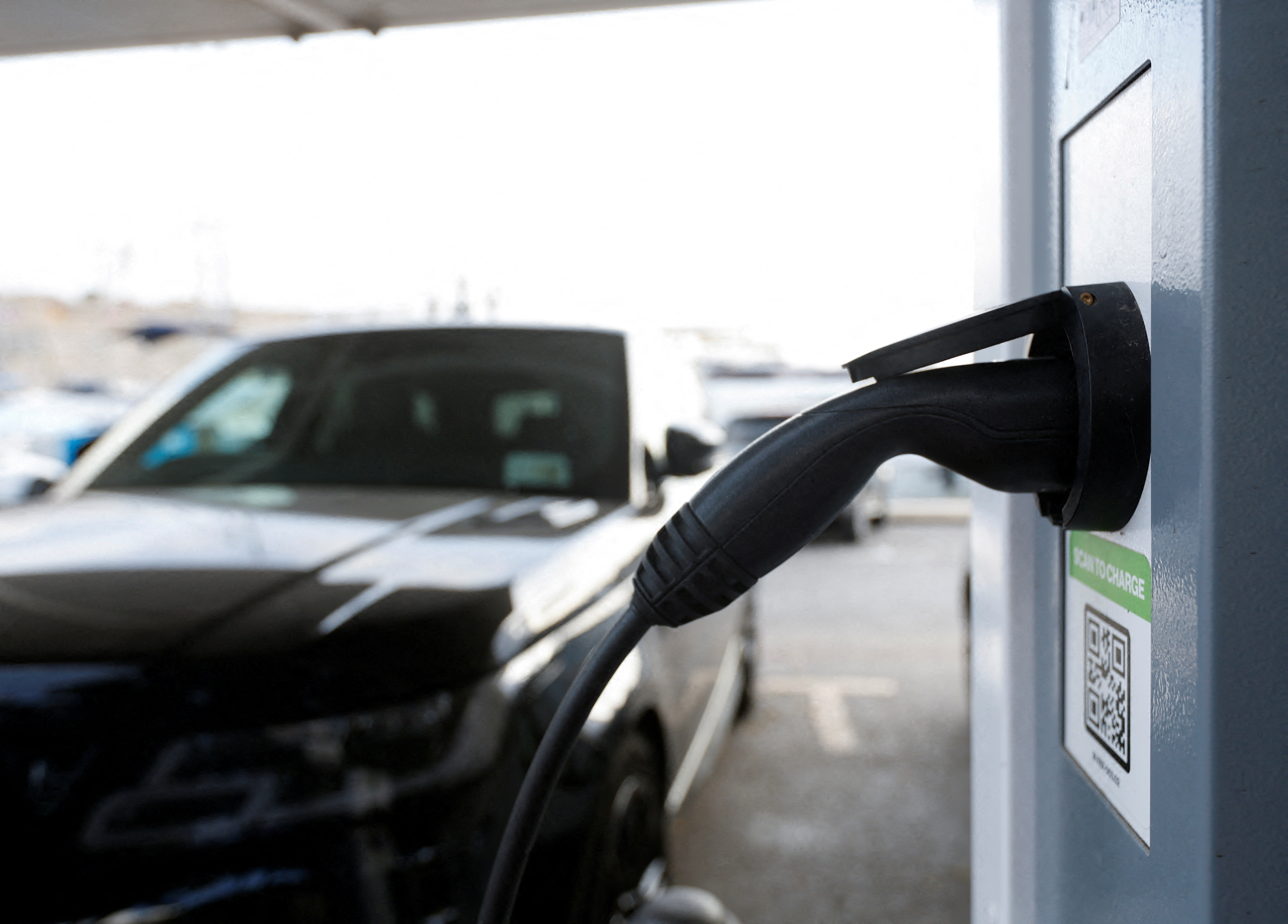 EV charger station firms battle for prime locations in Europe, US