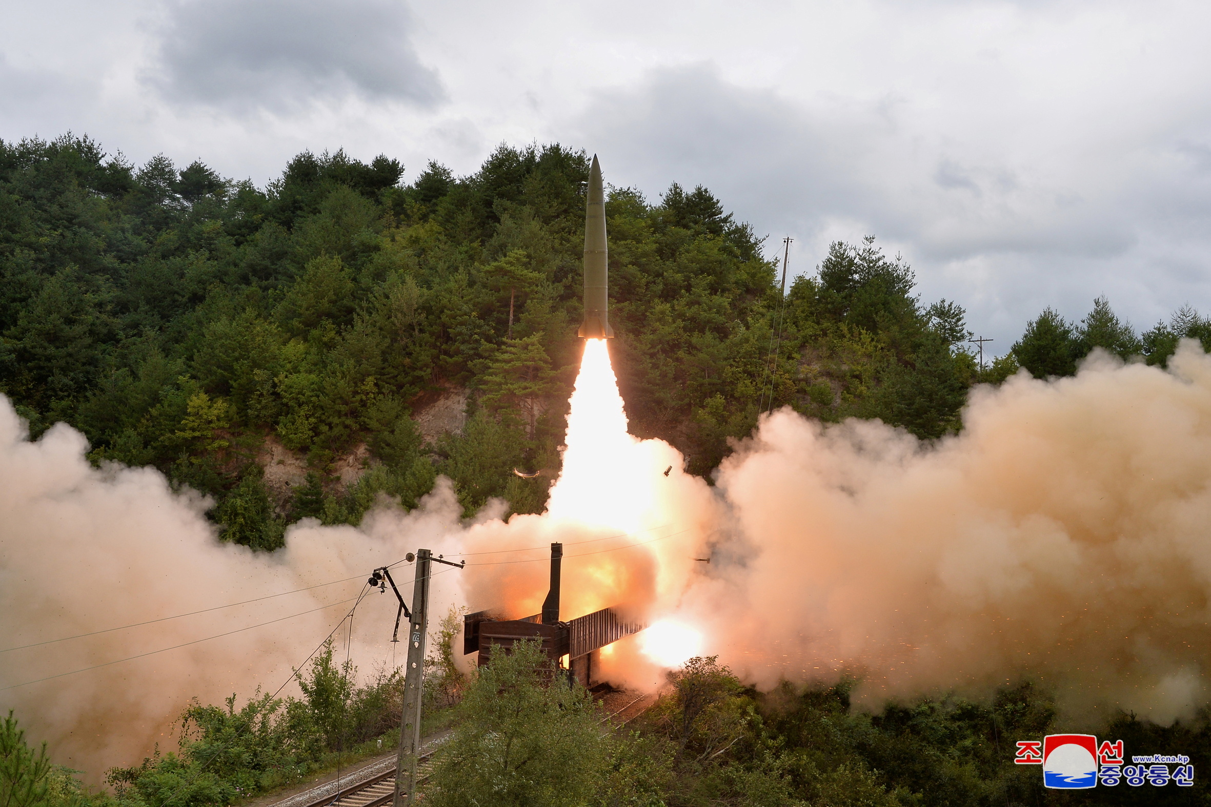 A missile is seen launched during a drill of the Railway Mobile Missile Regiment in North Korea
