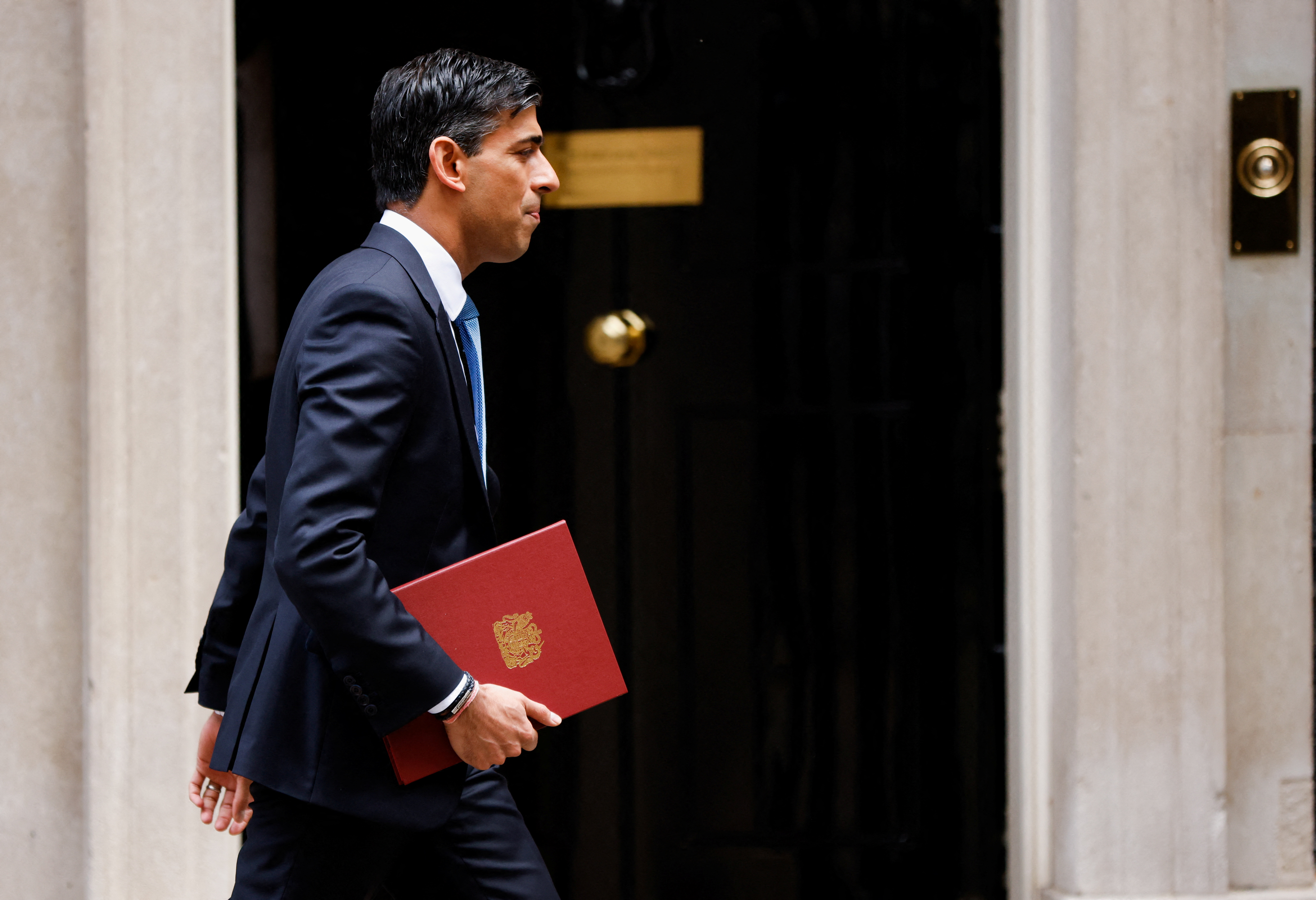 British Chancellor of the Exchequer Rishi Sunak leaves Downing Street, in London