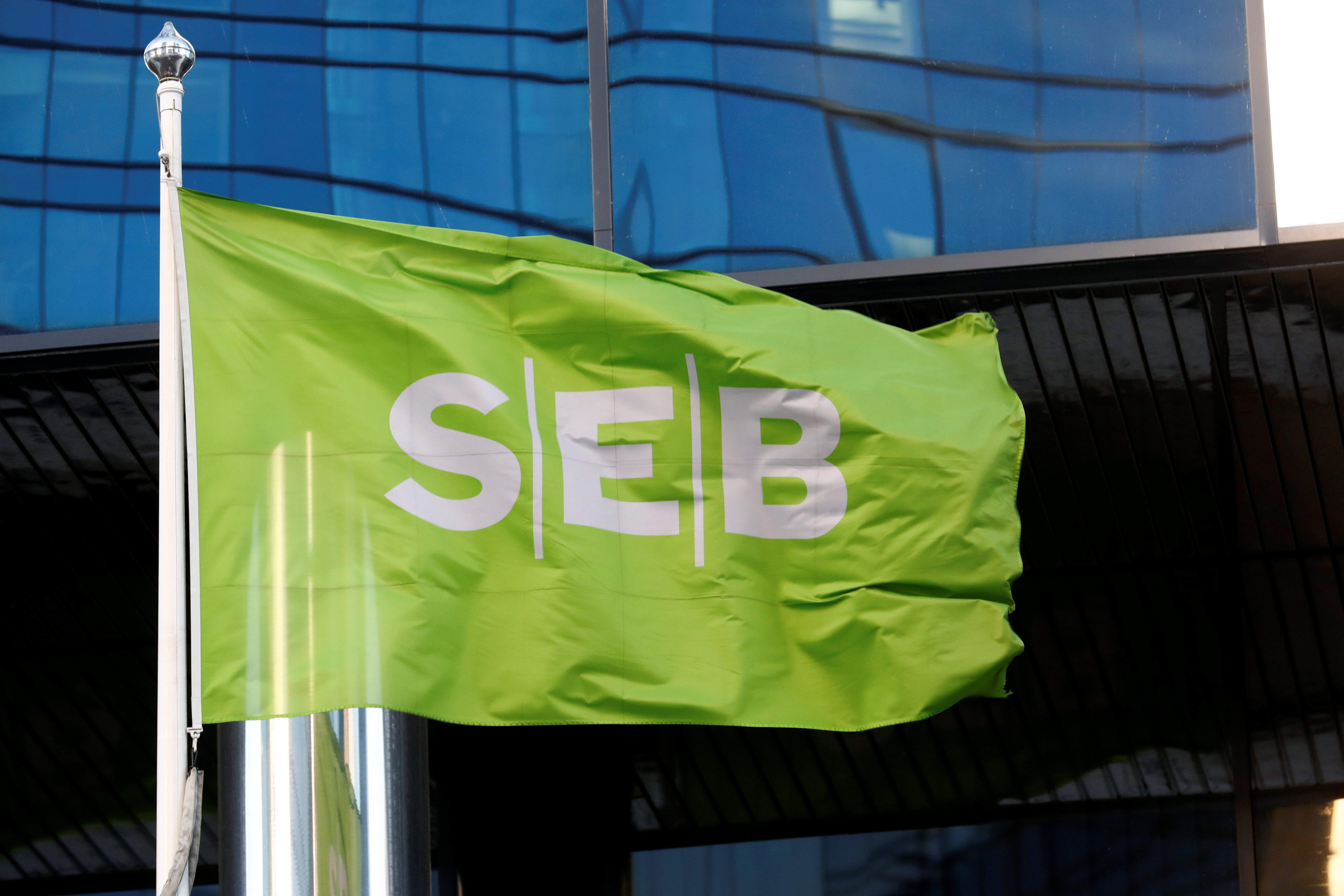 SEB bank flag flutters next to the bank's building in Tallinn
