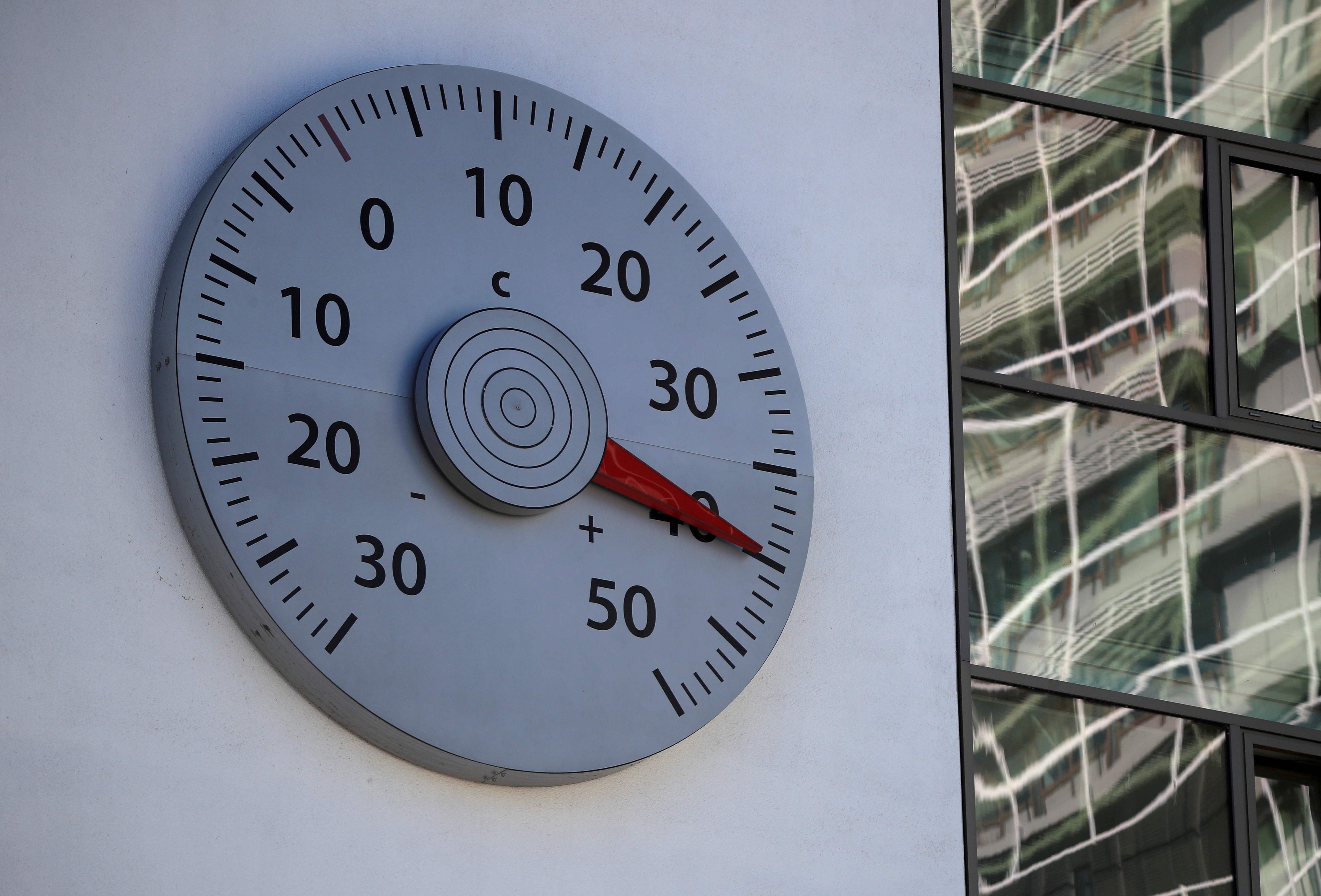 A thermometer mounted on a wall of the headquarters of the United Nations Framework Convention on Climate Change (UNFCCC) shows a temperature of 40 Celsius degrees in Bonn