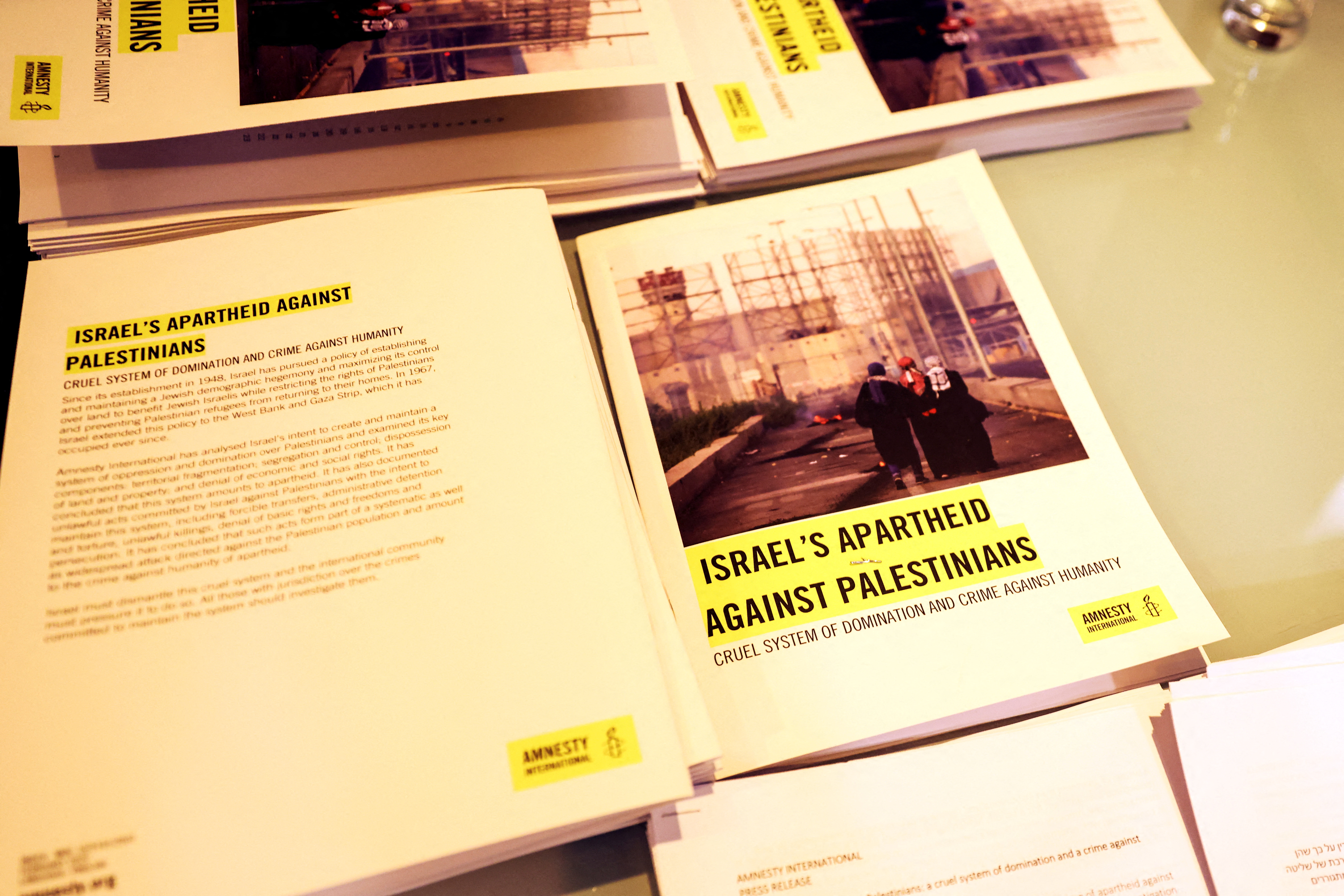 Amnesty International holds a press conference to announce its 211-page report named 