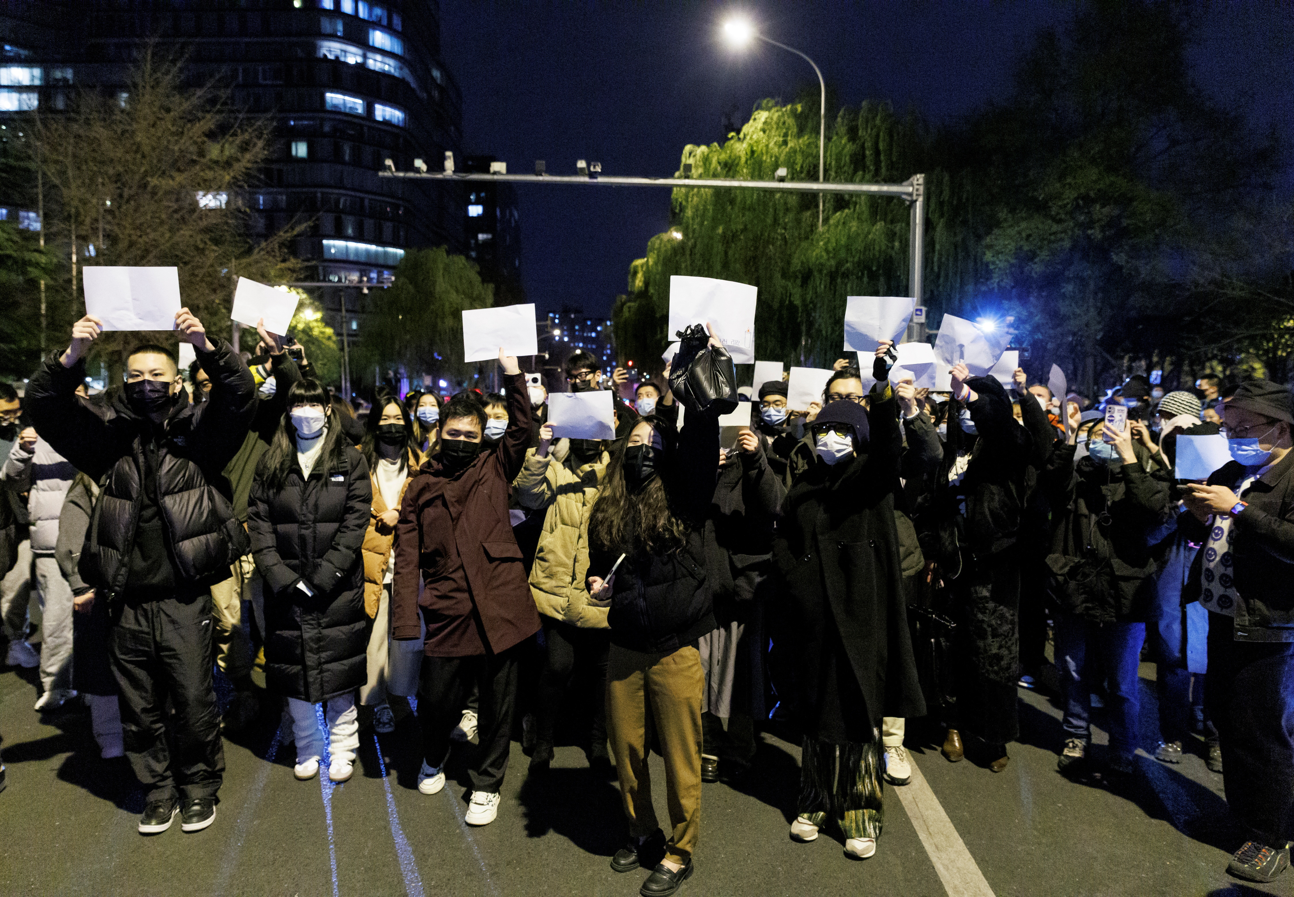 Vigil commemorating victims of a fire in Urumqi, in Beijing