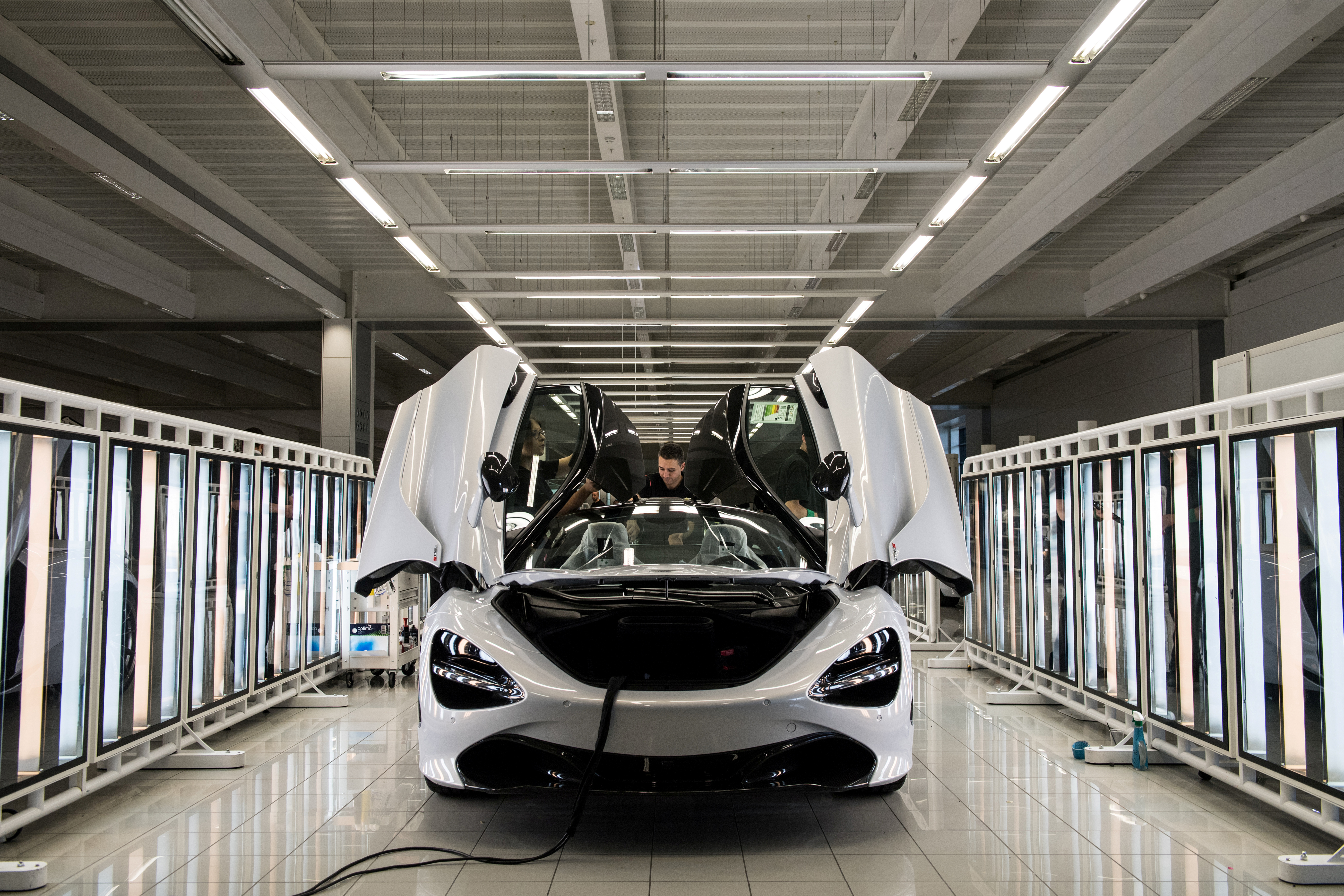 A McLaren 720S is assembled on the factory floor of the McLaren Automotive Production Centre Woking