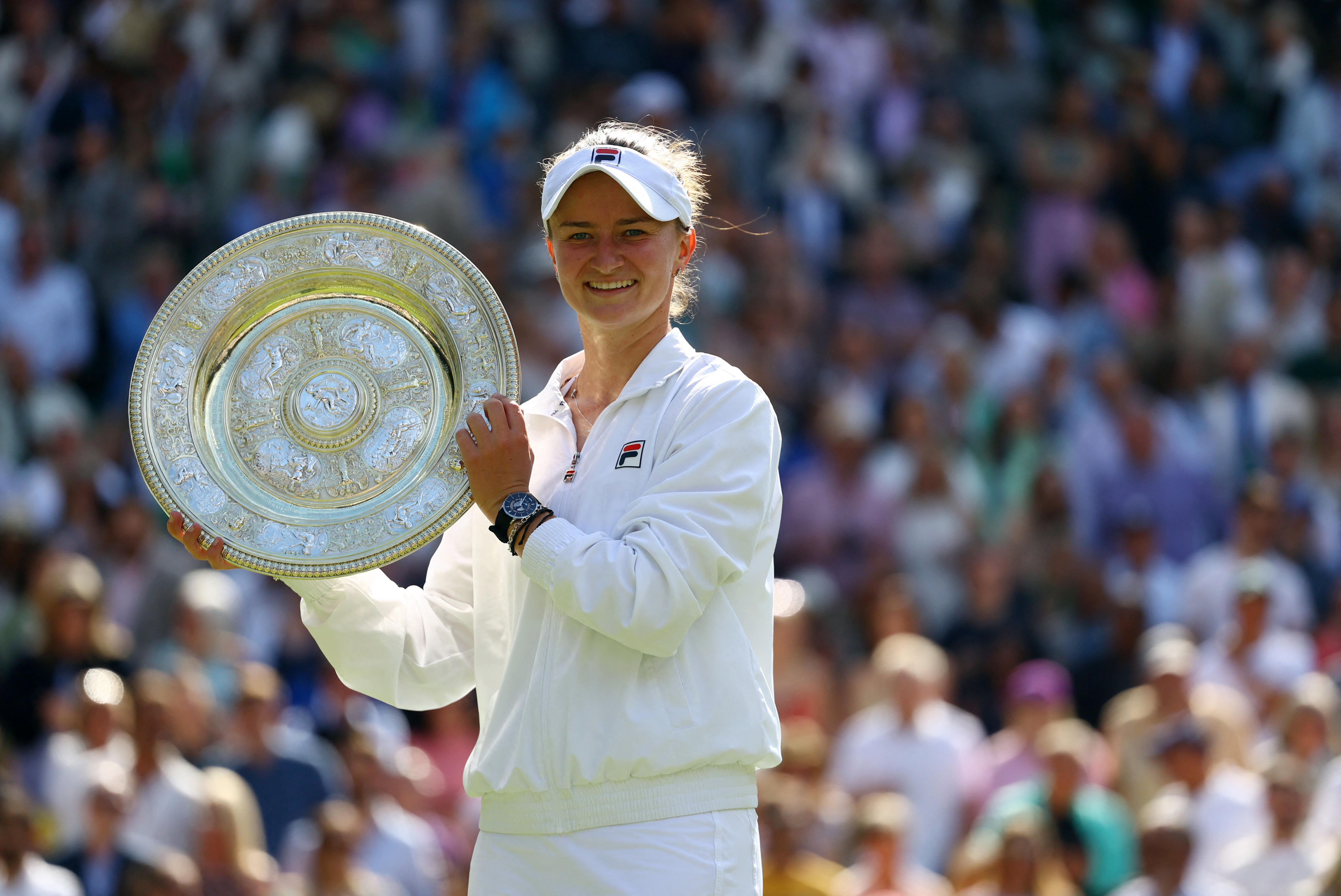 Krejcikova holds off Paolini to win Wimbledon title | Reuters