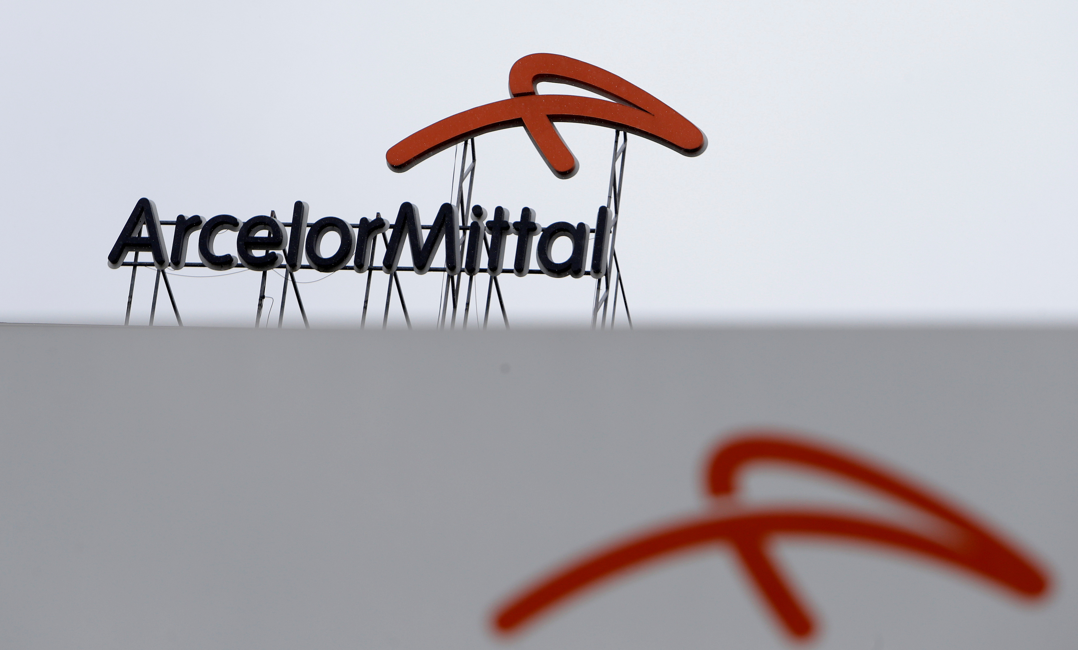A logo is seen on the roof of the ArcelorMittal steelworks headquarters in Ostrava