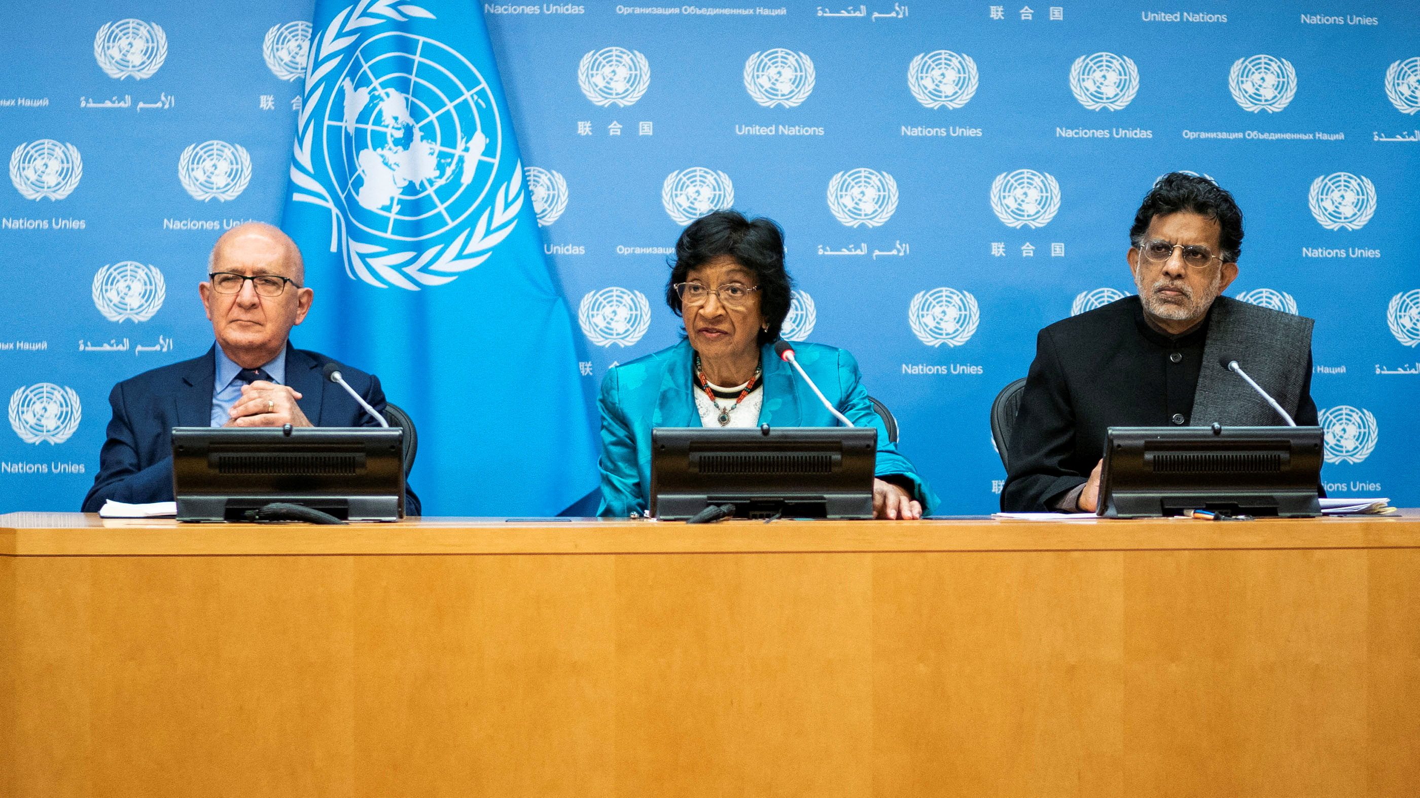 Members of the UN Independent International Commission of Inquiry attend a press briefing at the UN headquarters in New York