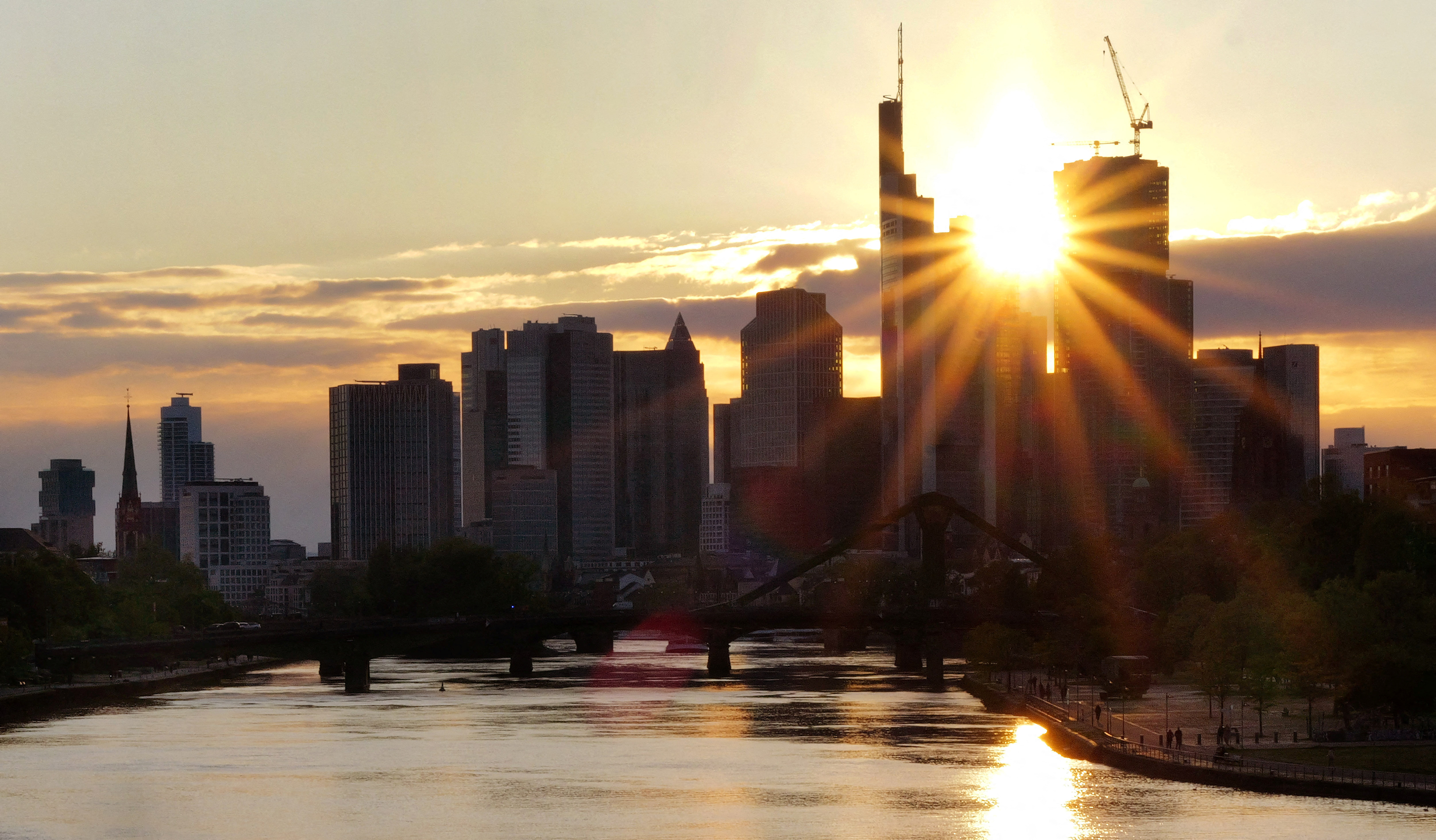 The skyline of the banking district is seen during sunset in Frankfurt
