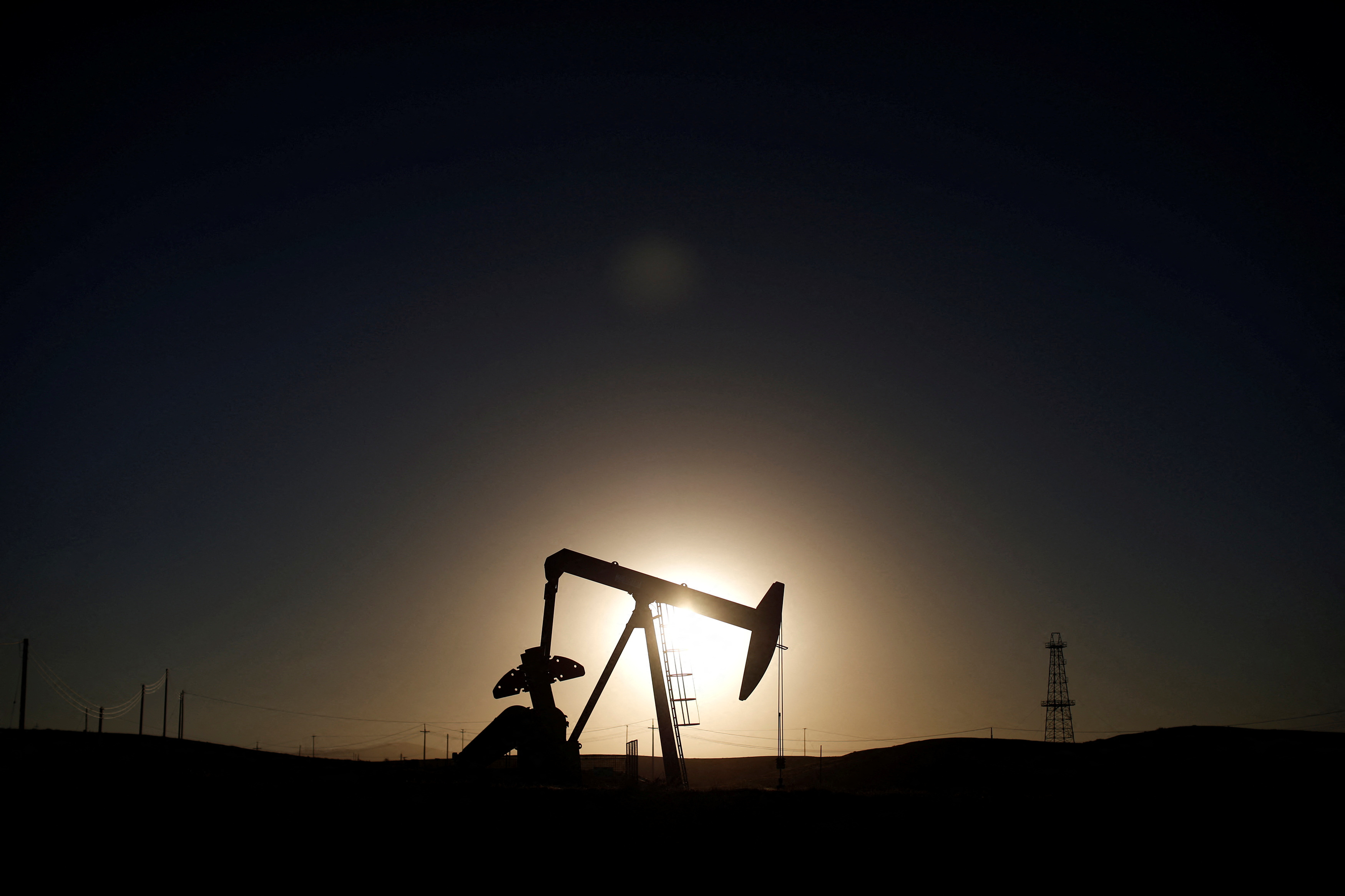 FILE PHOTO: A pump jack is seen at sunrise near Bakersfield