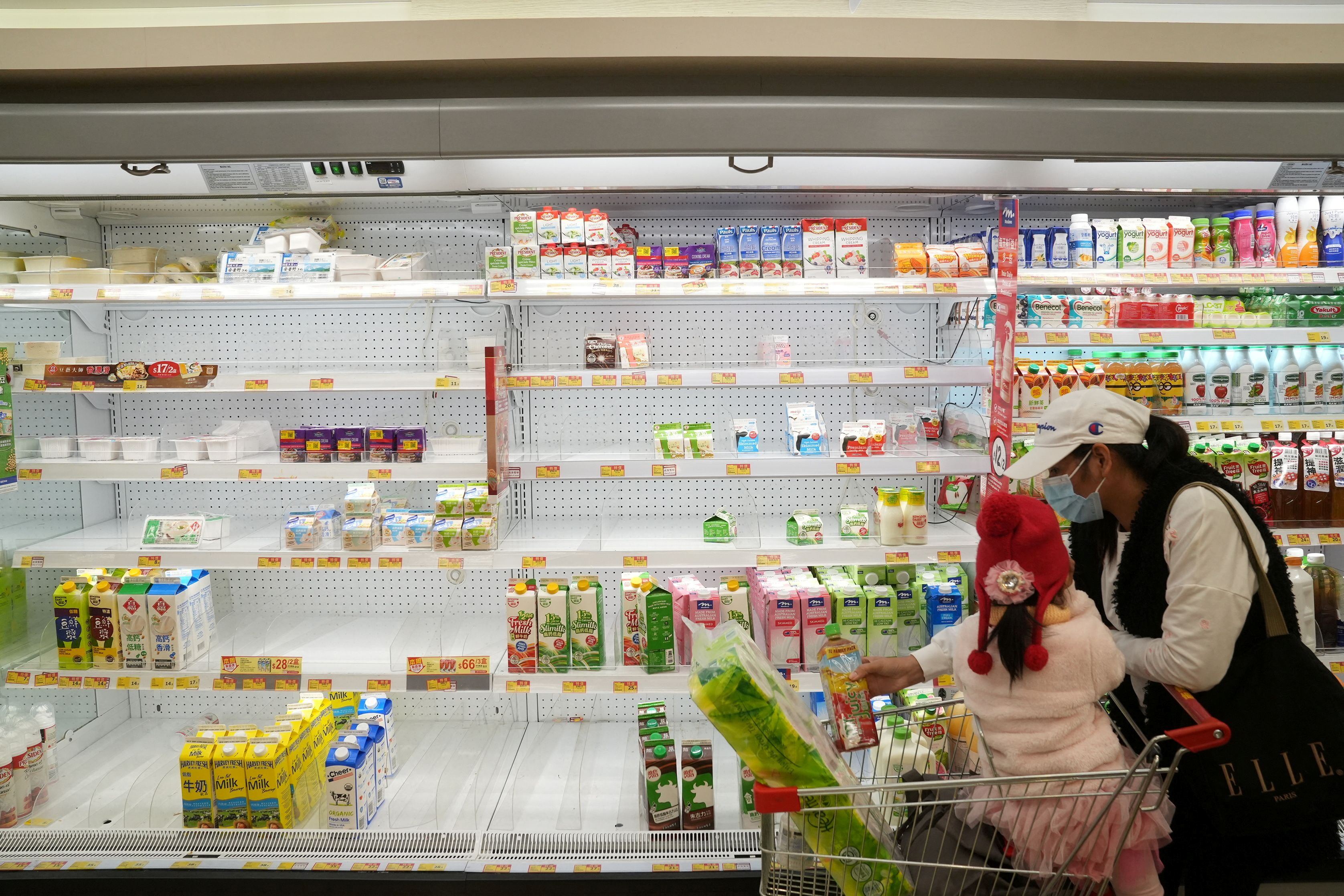Customers shop at a supermarket, following the outbreak of the coronavirus disease (COVID-19), at Sha Tin district, in Hong Kong