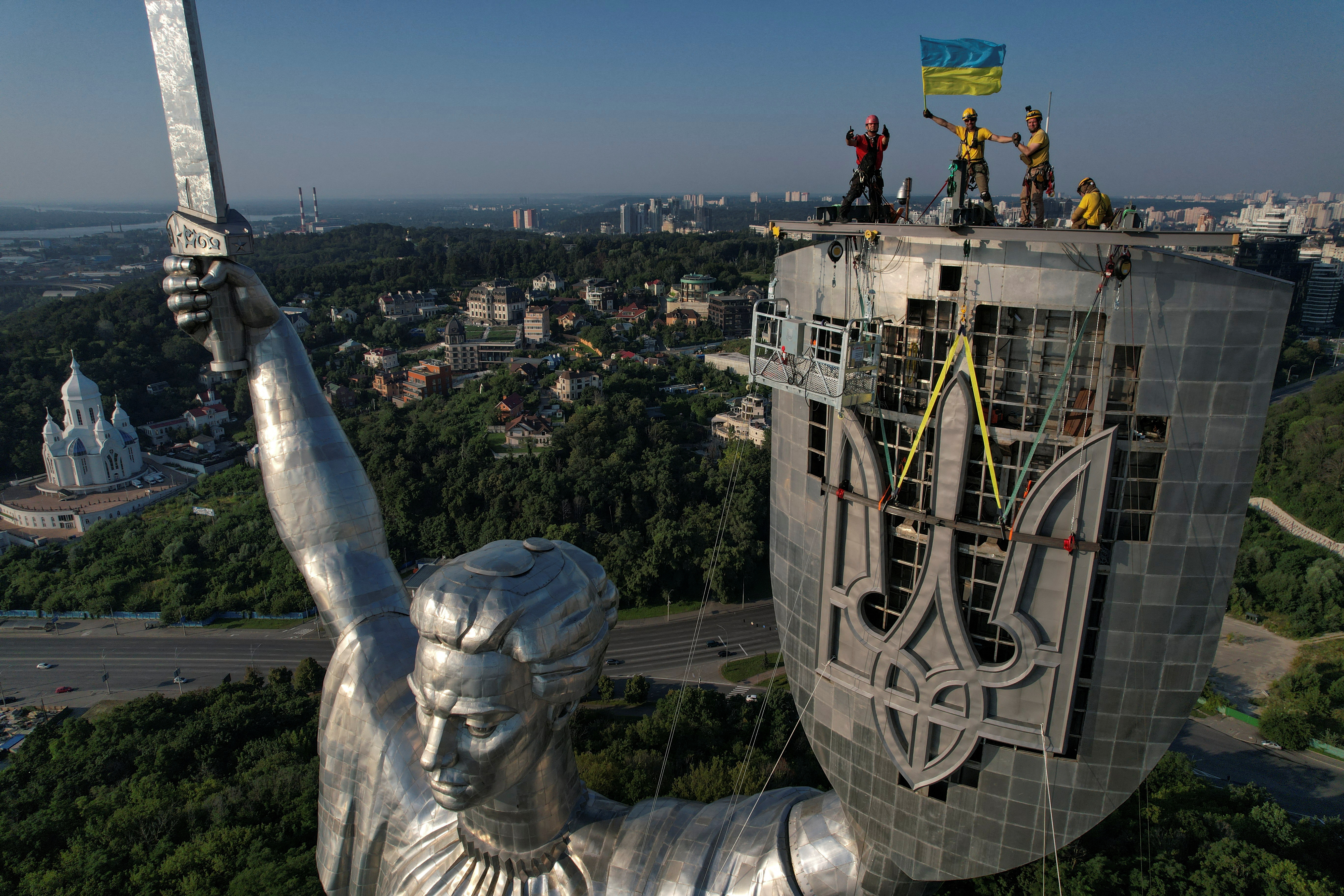 Ukraine replaces Soviet symbols on Kyiv's iconic Motherland