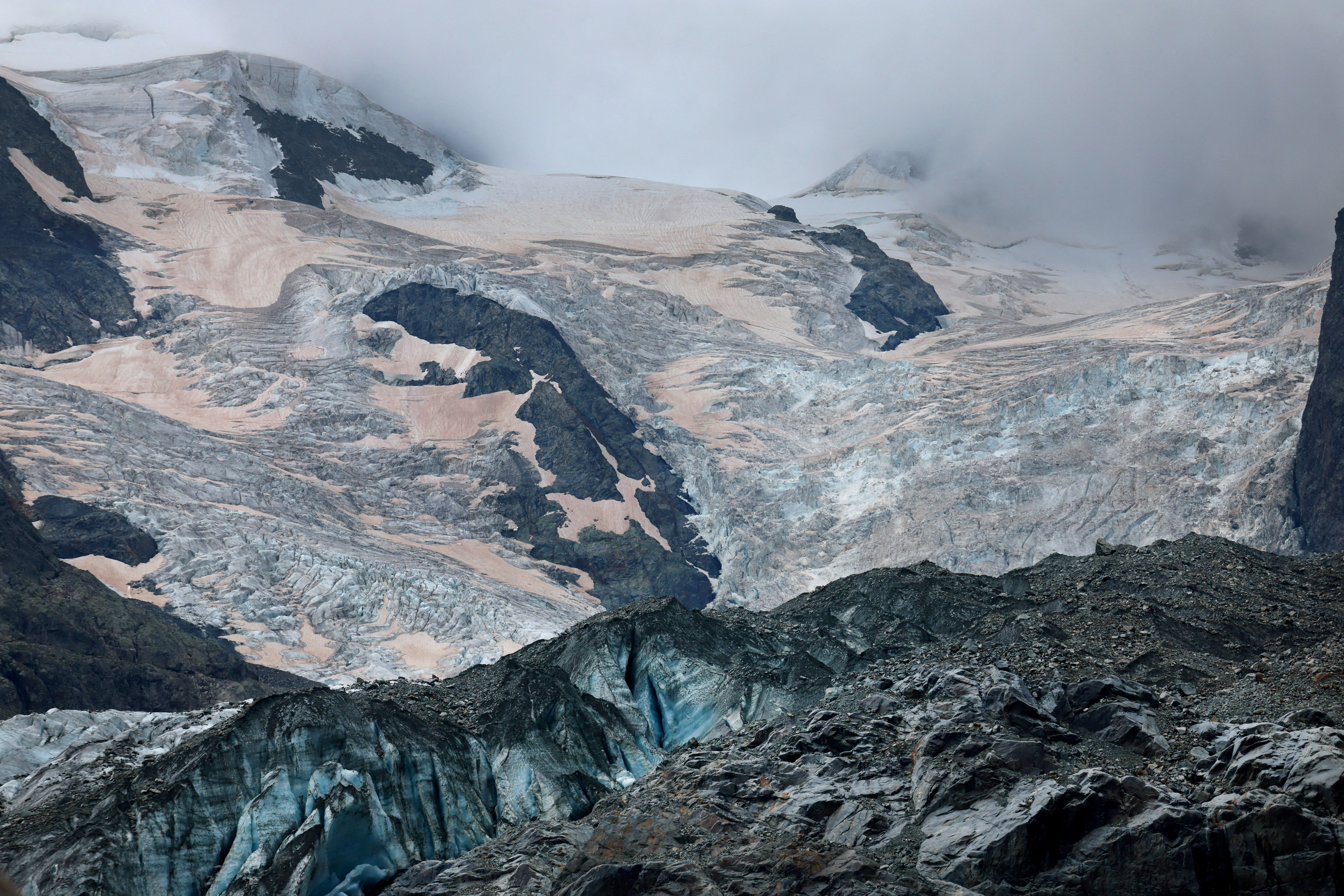 Crevasses and Sahara dust are seen on the Morteratsch Glacier, in Pontresina