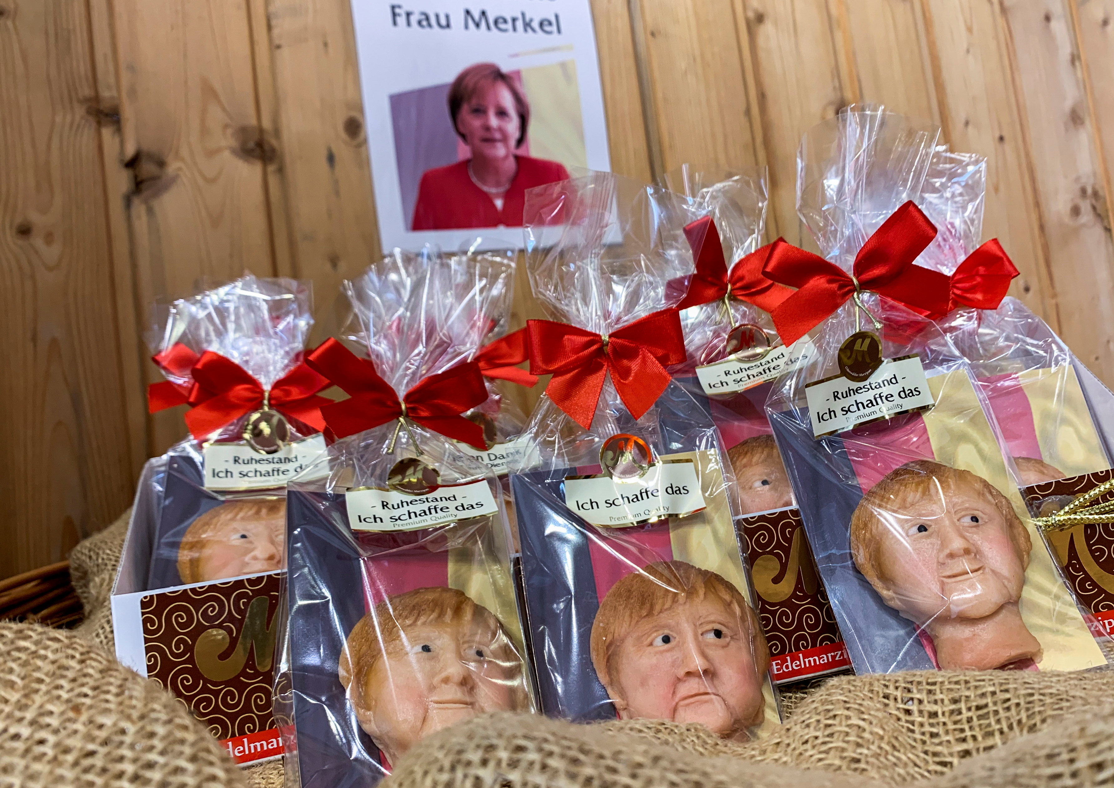 Marzipan cookies depicting German Chancellor Angela Merkel made by a German confectioner ahead of the September 26 elections, are displayed in Weilbach, Germany, September 14, 2021. REUTERS/Annkathrin Weis