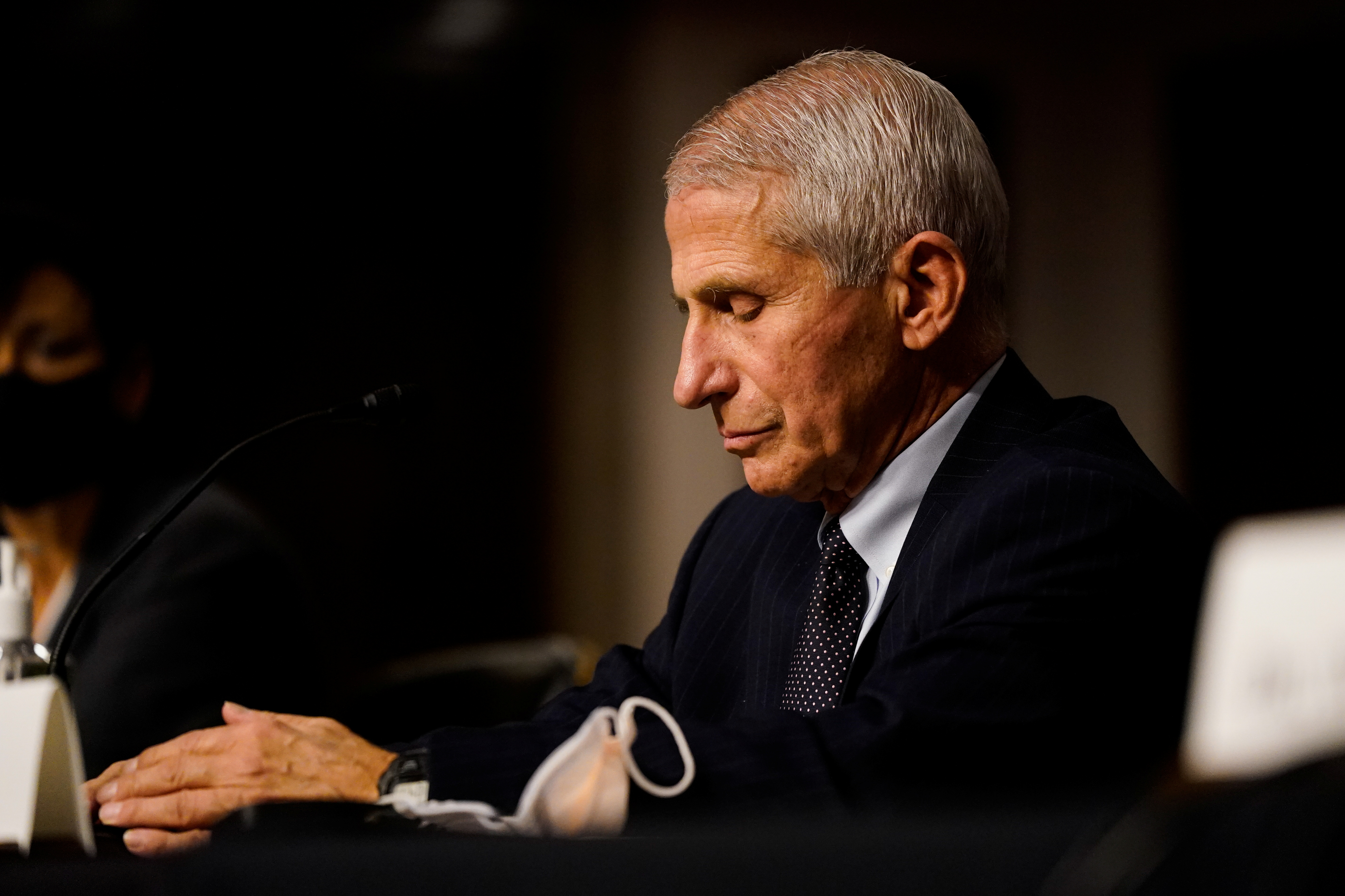 White House Chief Medical Adviser Anthony Fauci listens to other speakers during the Senate Health, Education, Labor and Pensions hearing on 