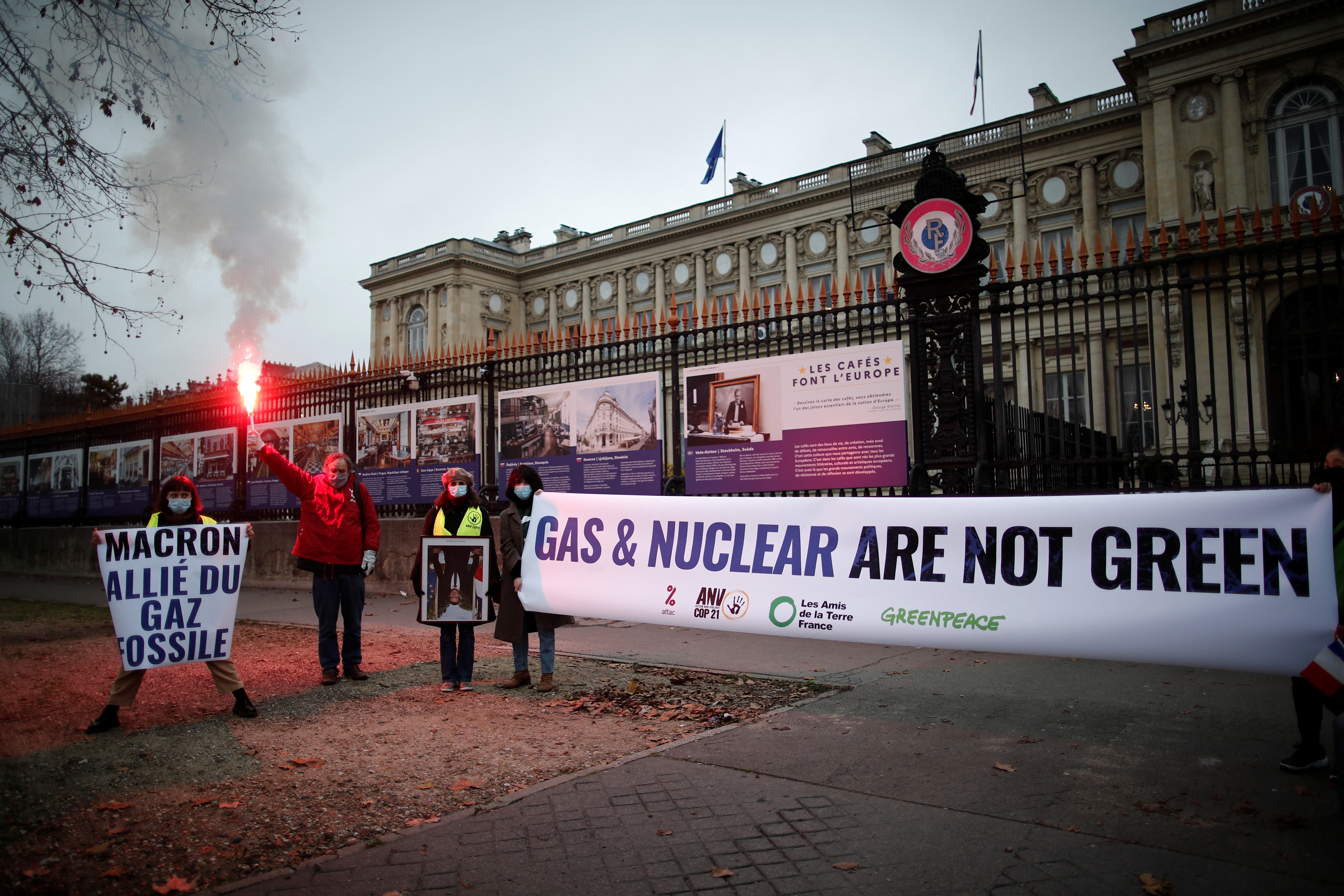 Green activists stage a protest to denounce French push to include nuclear energy and fossil gas in the EU Green taxonomy, in Paris