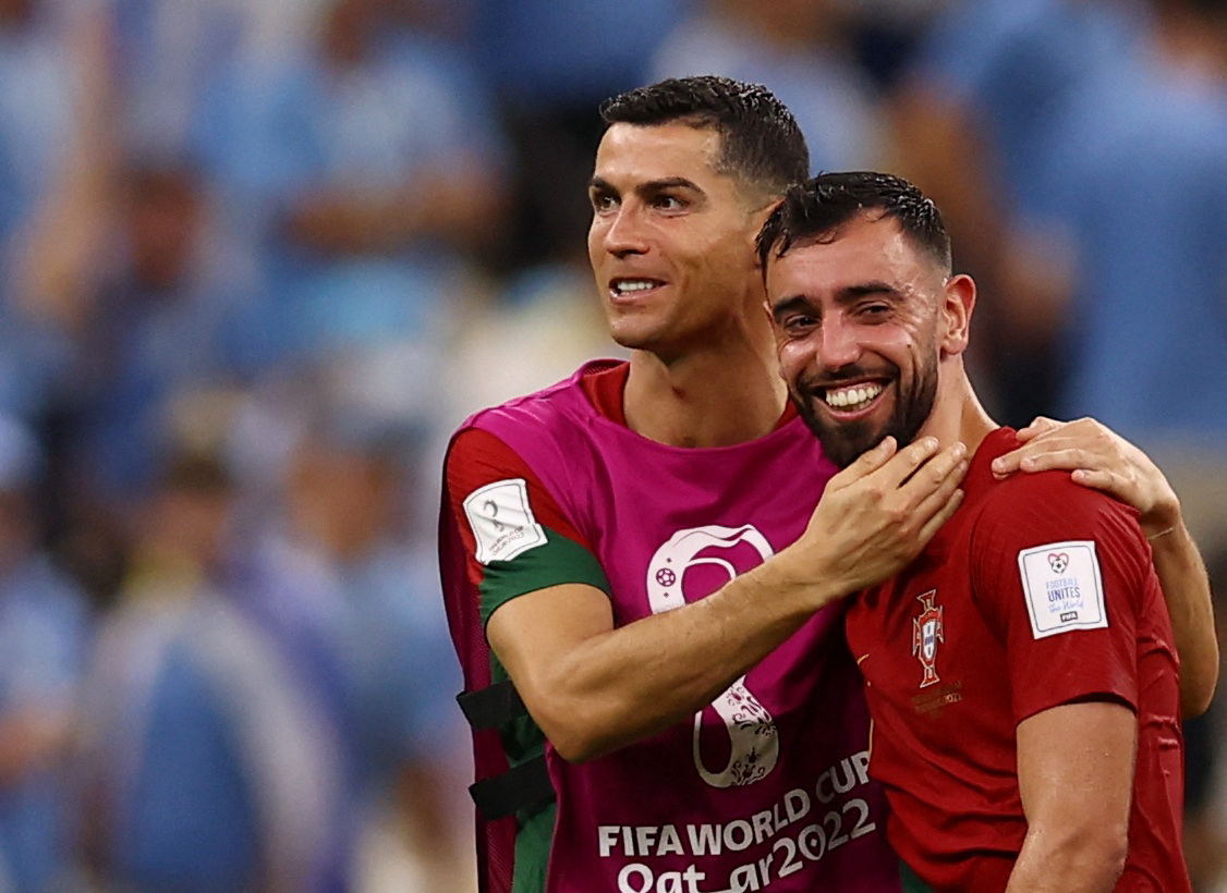 Portugal's Cristiano Ronaldo heads the ball during a team training