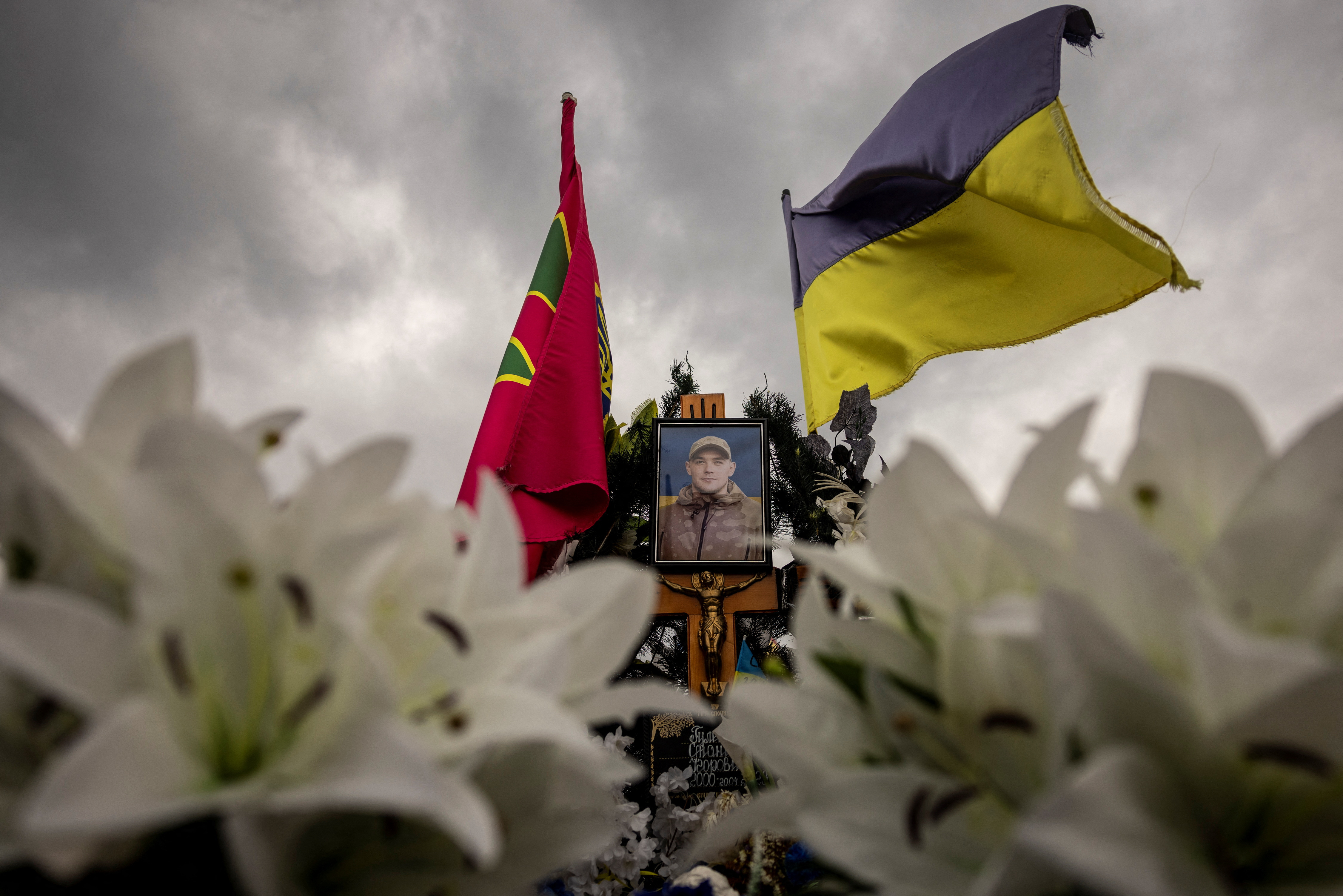 Ukrainian flag flies over the grave of judoka Stanislav Hulenkov, who was killed fighting against Russia's invasion, in Lutsk