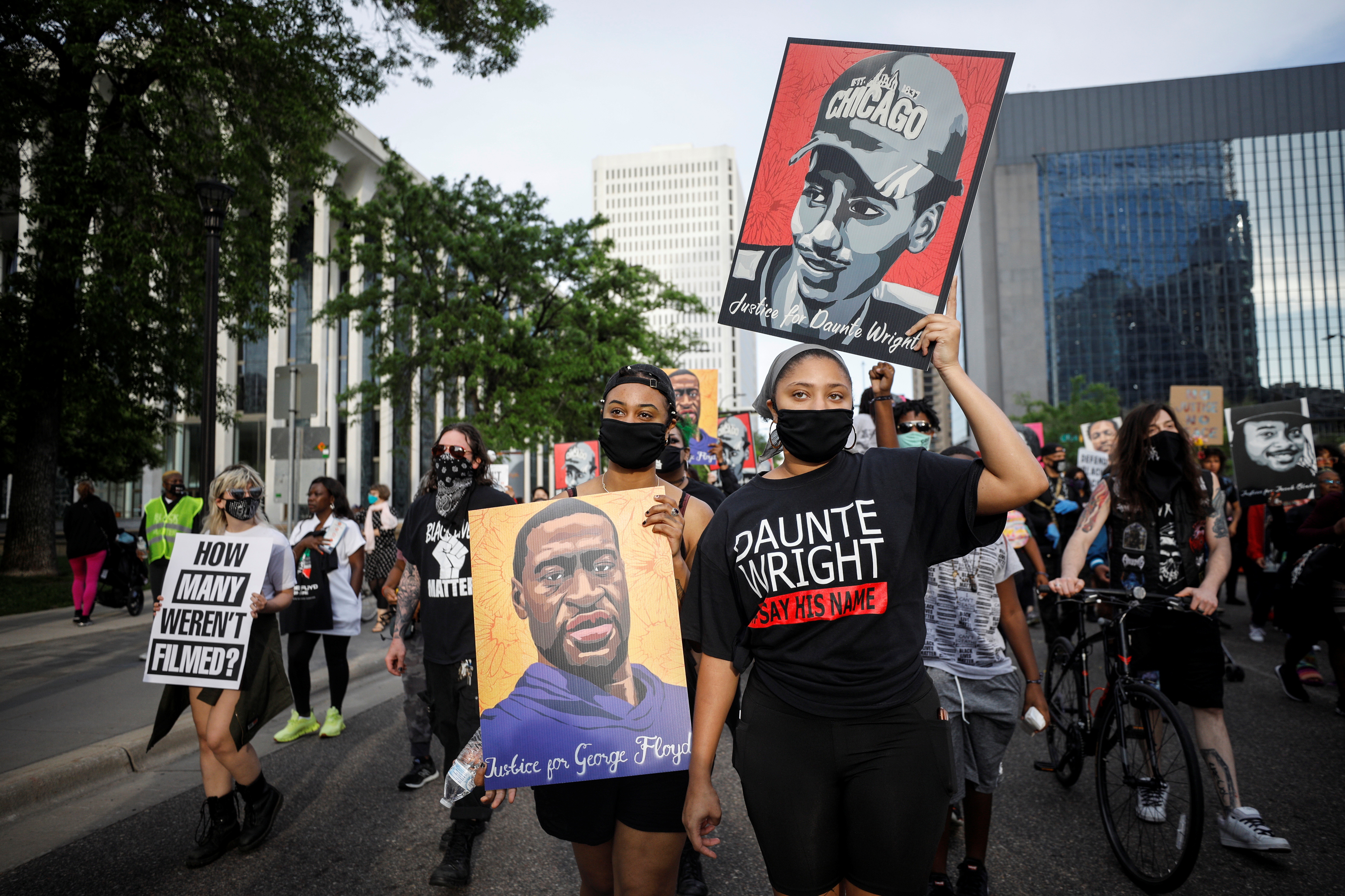 People march during the "One Year, What's Changed?" rally hosted by the George Floyd Global Memorial to commemorate the first anniversary of his death, in Minneapolis, Minnesota, U.S. May 23, 2021. REUTERS/Nicholas Pfosi