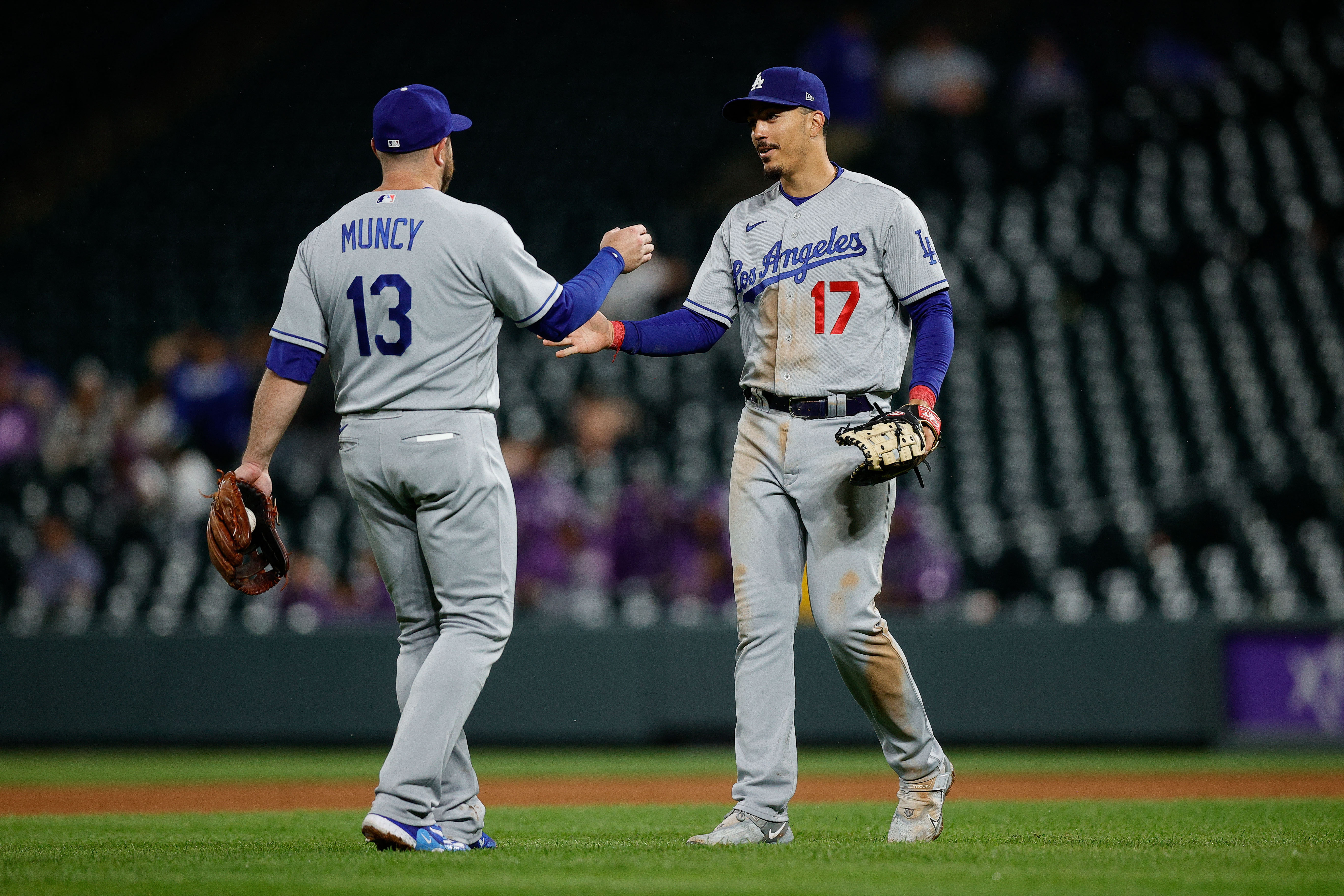 Martinez helps power Dodgers past Rockies 14-3 after a severe weather delay