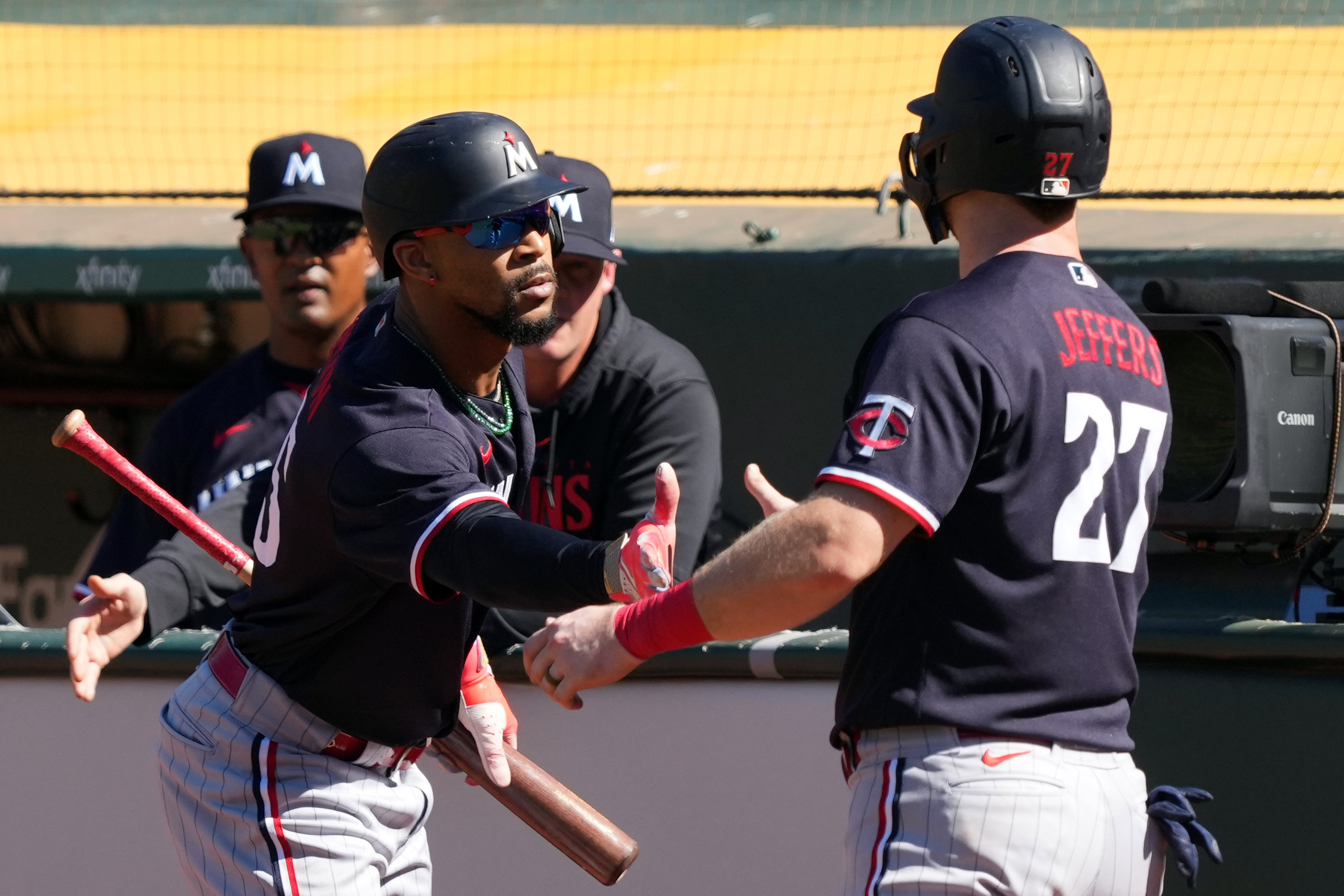 Kyle Farmer of the Minnesota Twins bats during a spring training