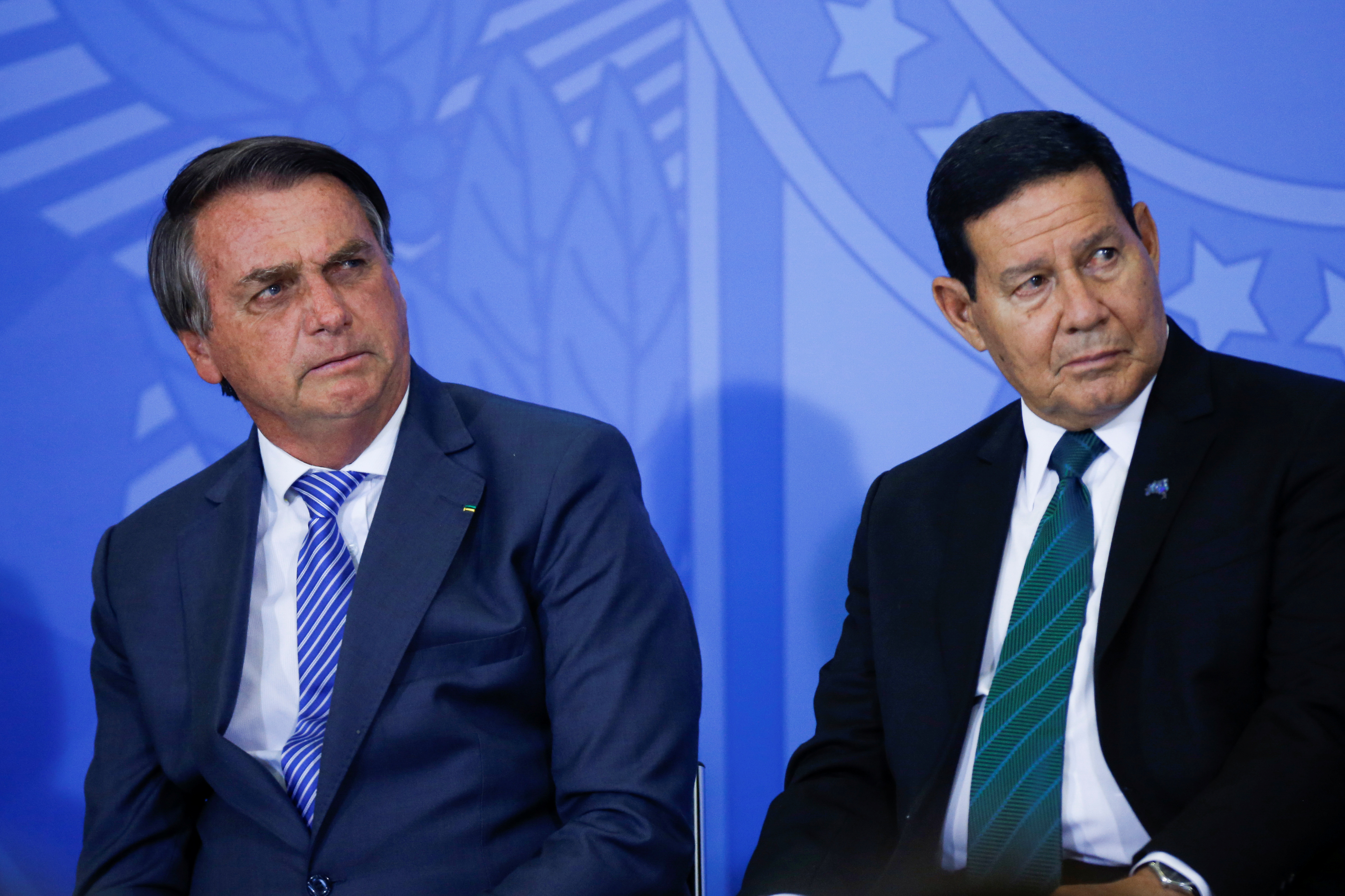 Brazil's President Jair Bolsonaro and Brazil's Vice President Hamilton Mourao attend a ceremony at the Planalto Palace