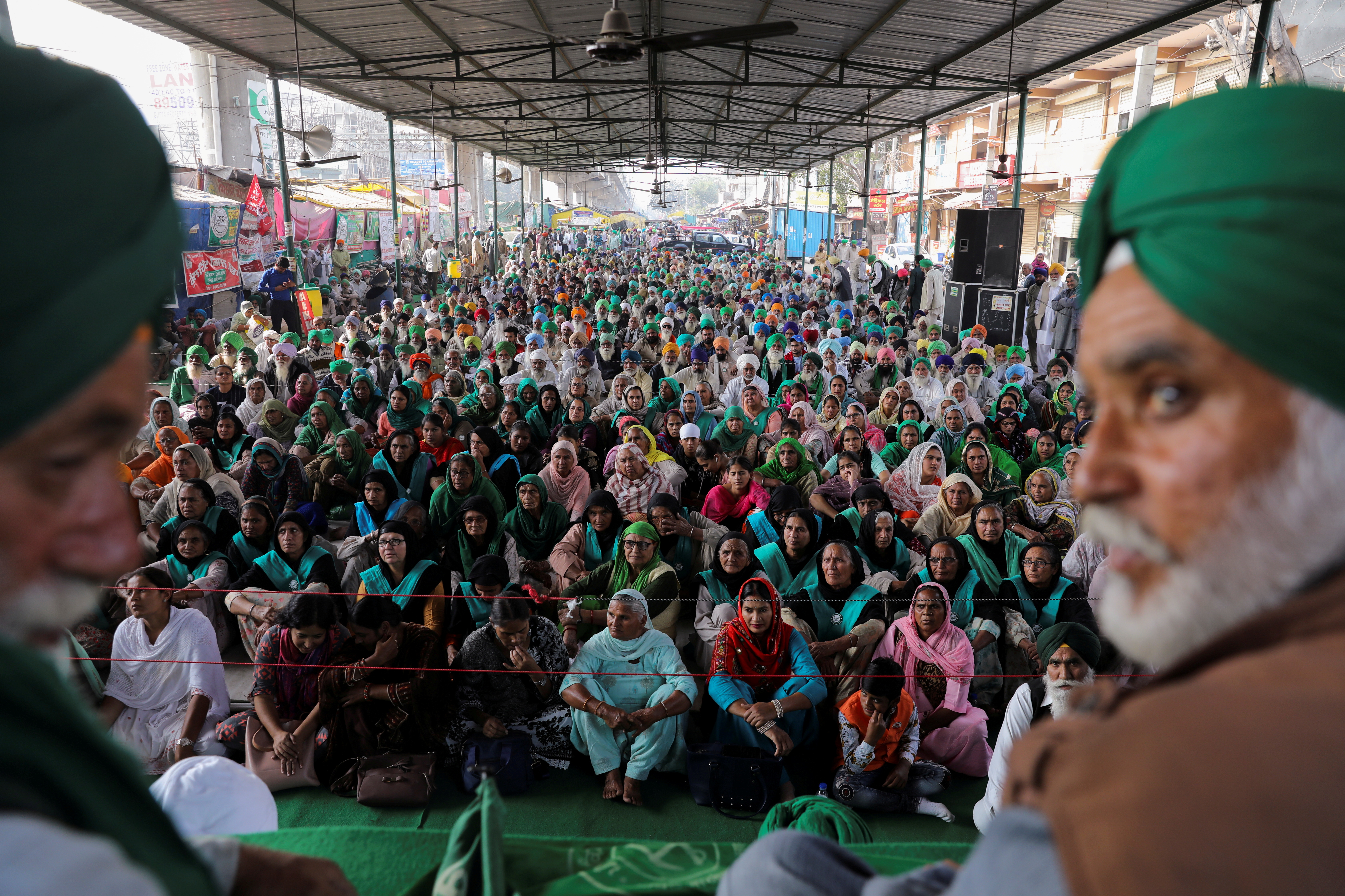 Farmers gather on the eve of the first anniversary of protests on the outskirts of Delhi at Tikri border