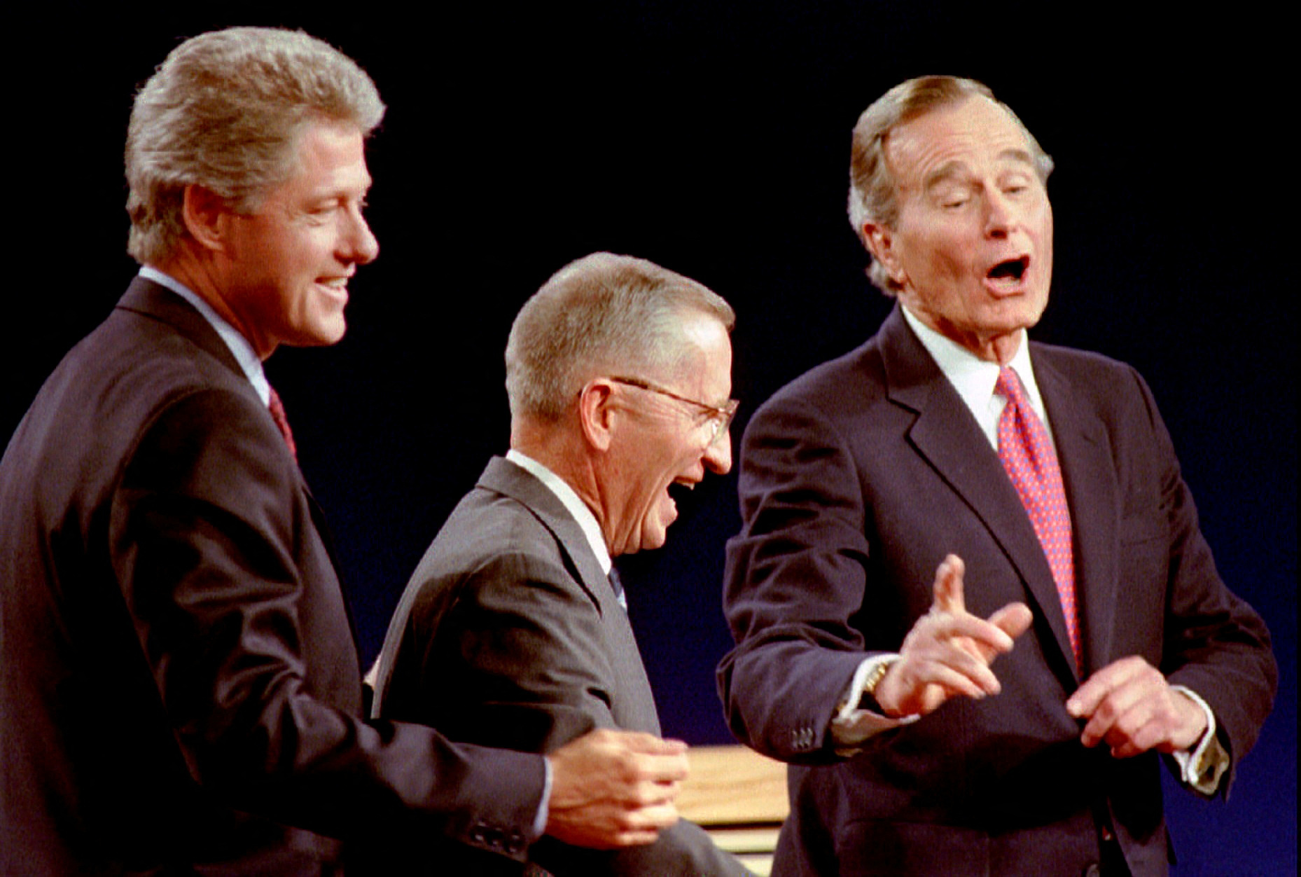 Clinton, Perot and Bush laugh at the conclusion of their 1992 Presidential debate in East Lansing