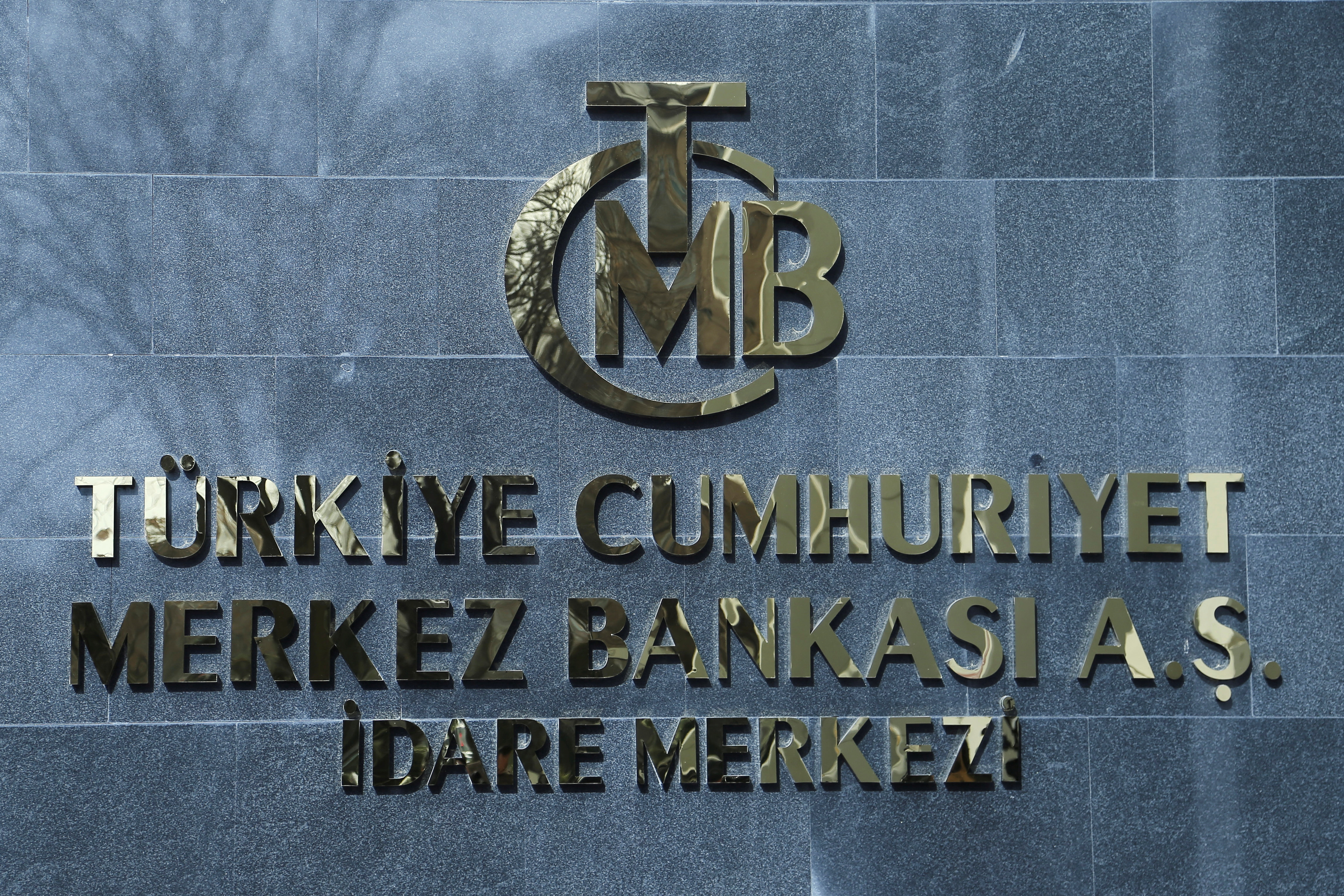 A logo of Turkey's Central Bank is pictured at the entrance to its headquarters in Ankara