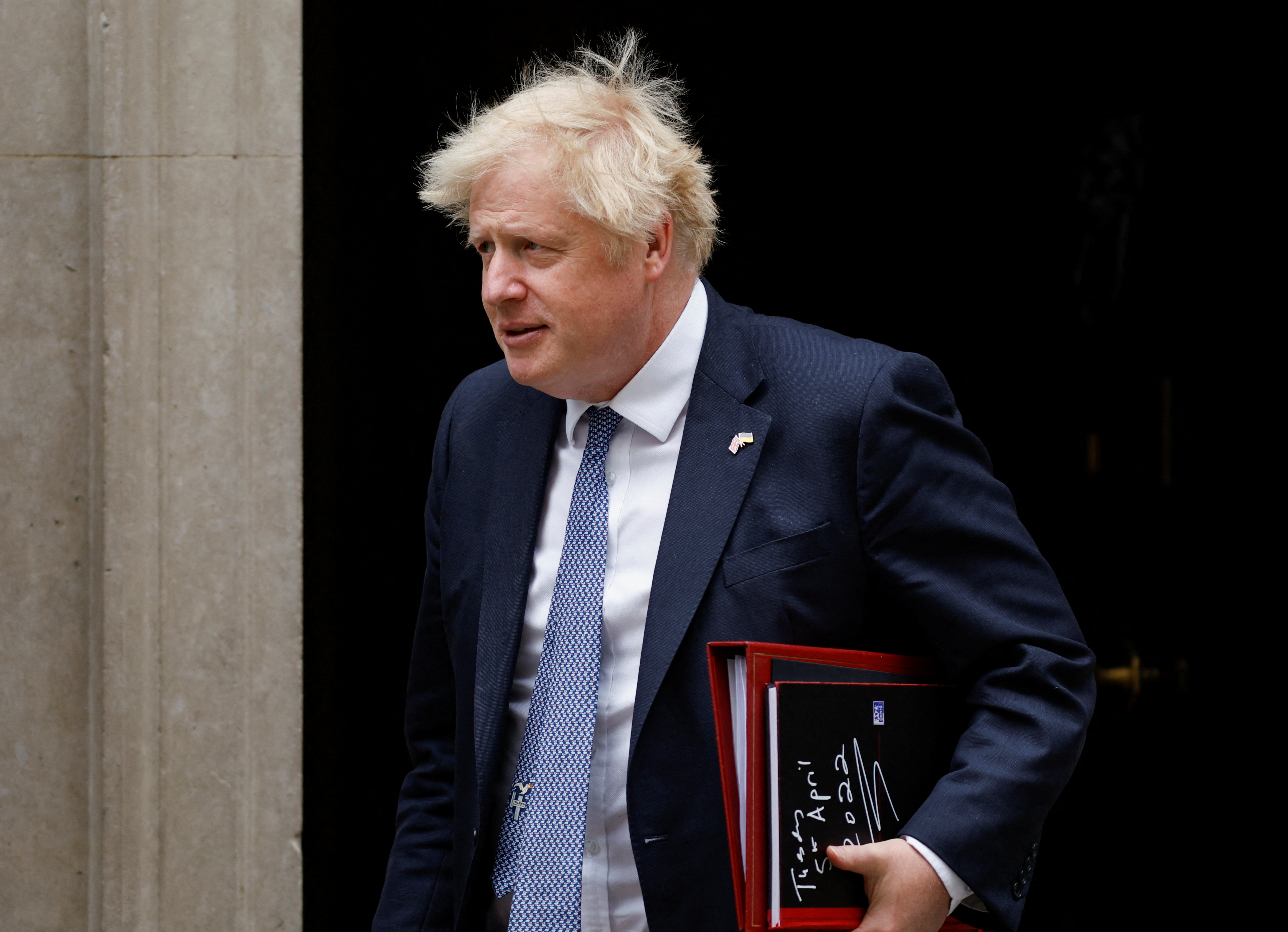 British PM Johnson leaves the 10 Downing Street, in London