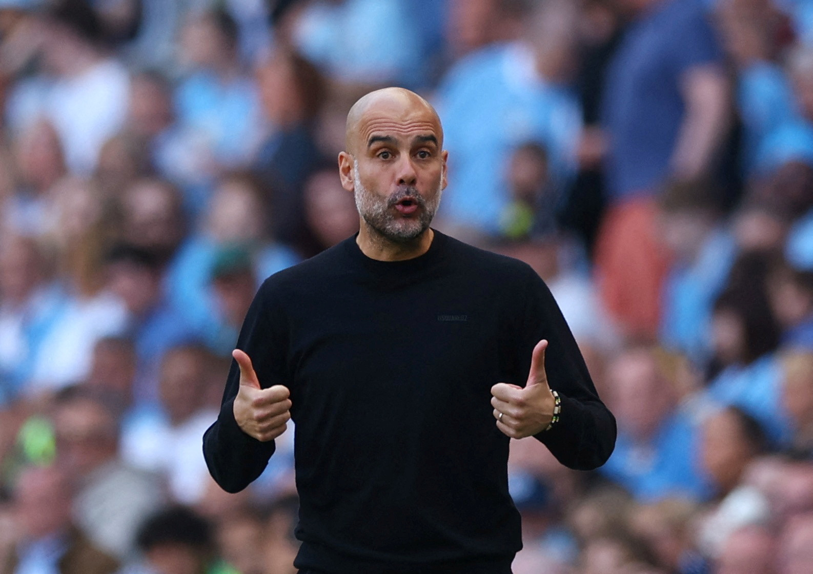 Guardiola hails Man City 'legends' after title defence