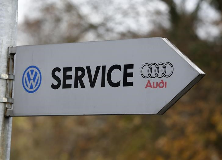 The sign reading 'Service' with logos of Audi and Volkswagen is pictured at a car shop in Bad Honnef