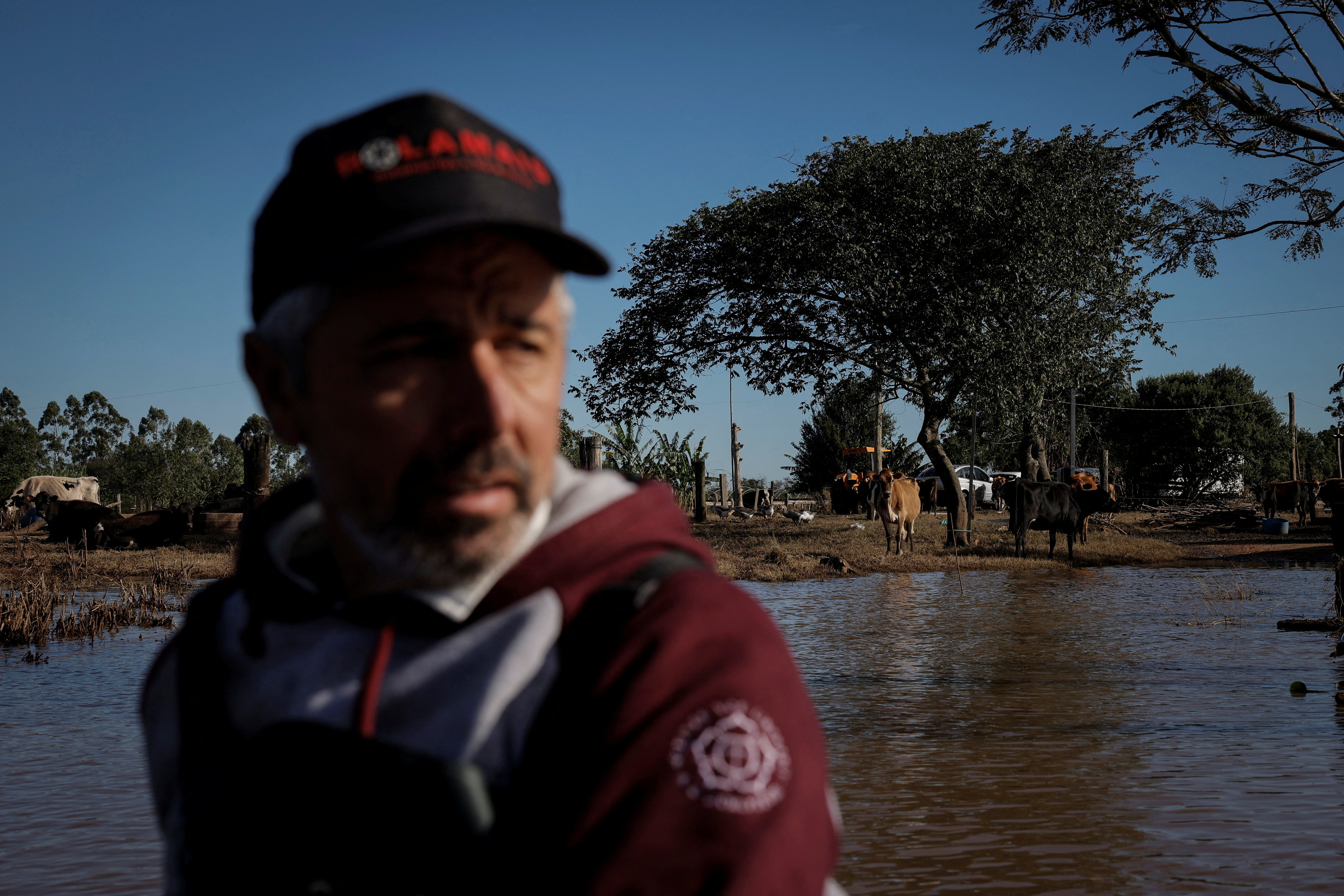 The Wider Image: Flood-battered farmers in southern Brazil wade through lost harvests