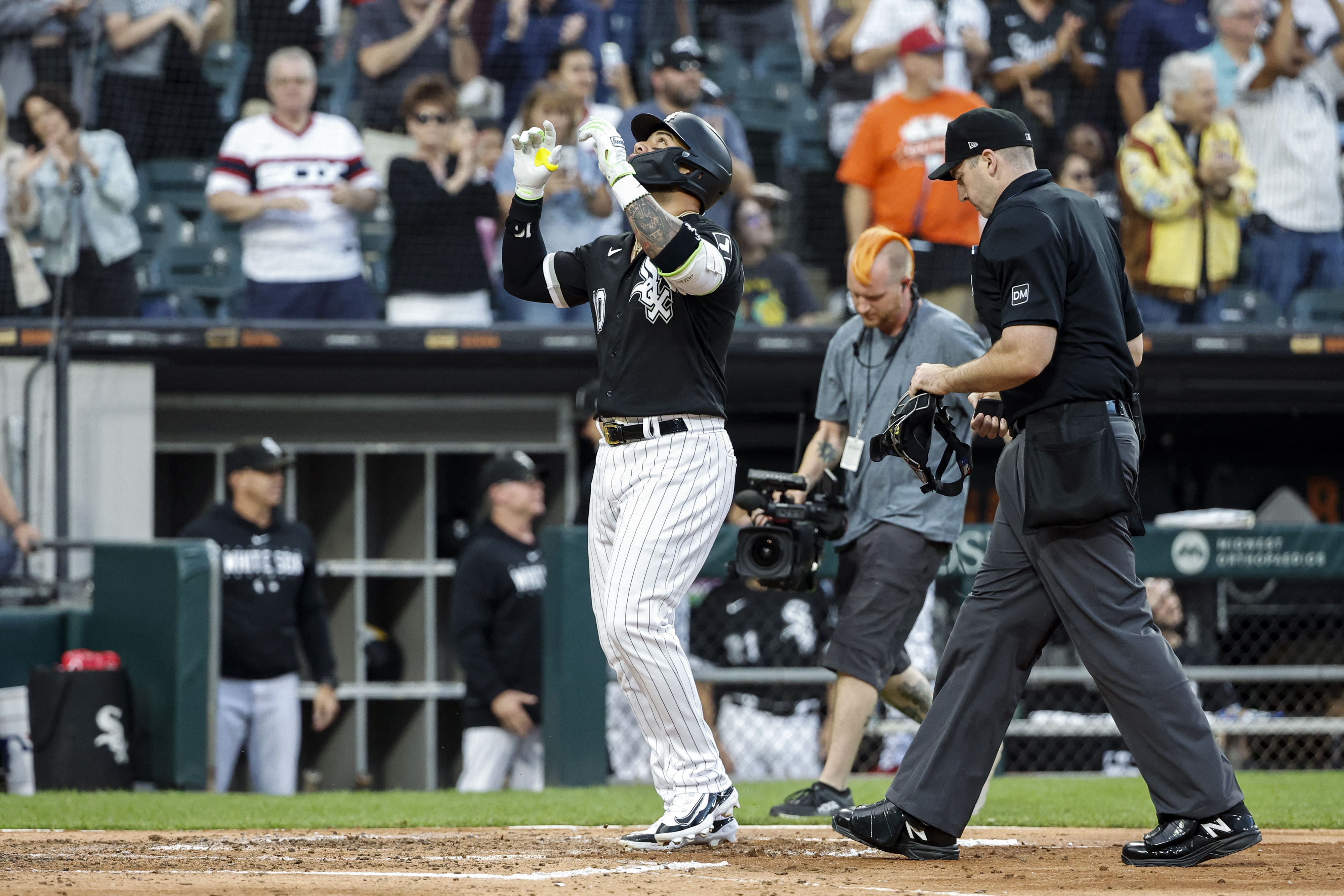 Chicago White Sox pinch hitter Carlos Pérez (36) celebrates his two-RBI  double against the Oakland Athletics during the eighth inning of a baseball  game, Saturday, July 1, 2023, in Oakland, Calif. (AP