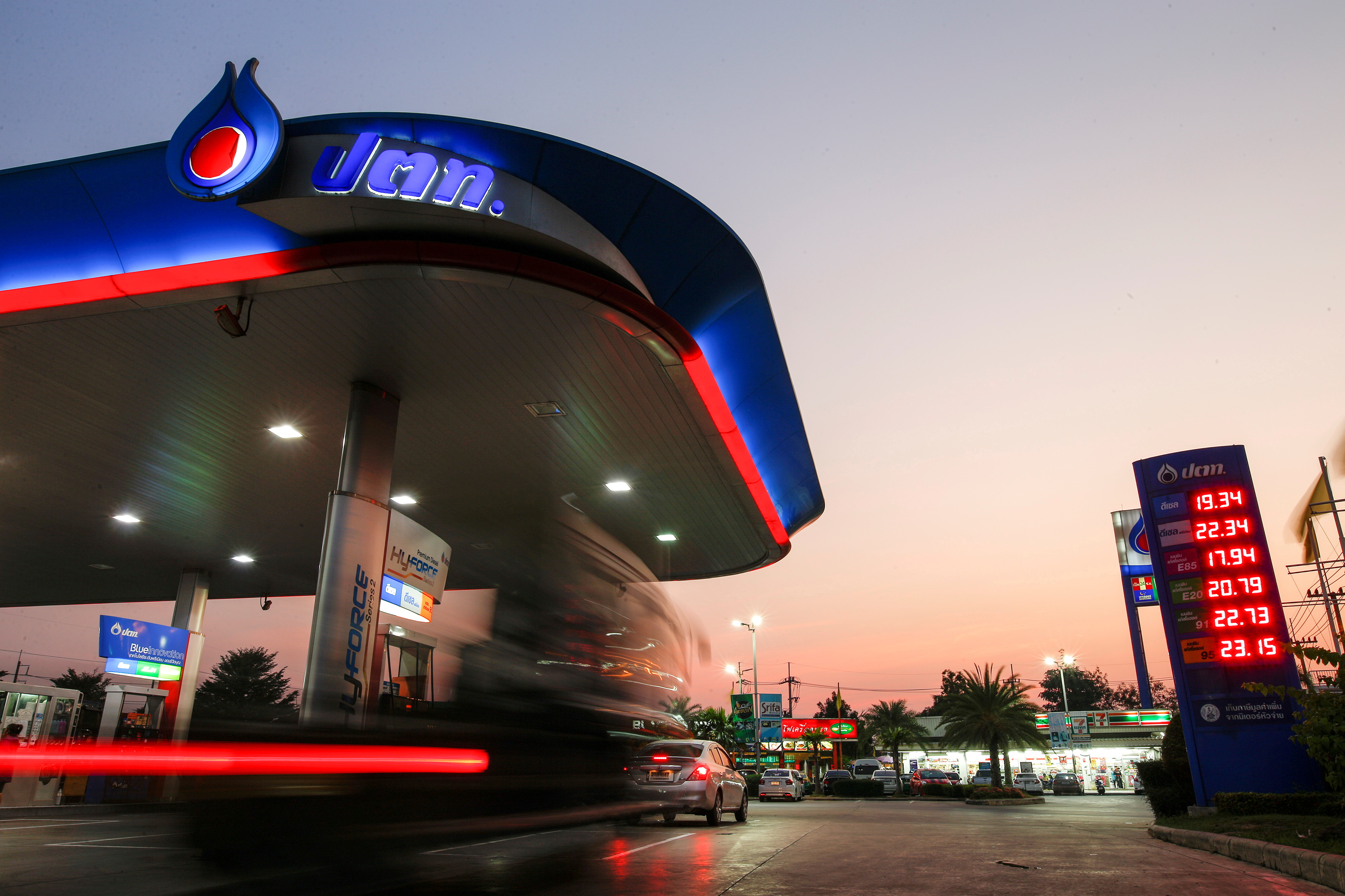 Cars stop at a PTT Public Company Limited's gas station in Bangkok