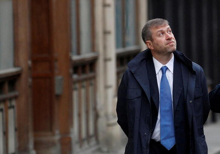 Chelsea Football Club owner Roman Abramovich walks past the High Court in London