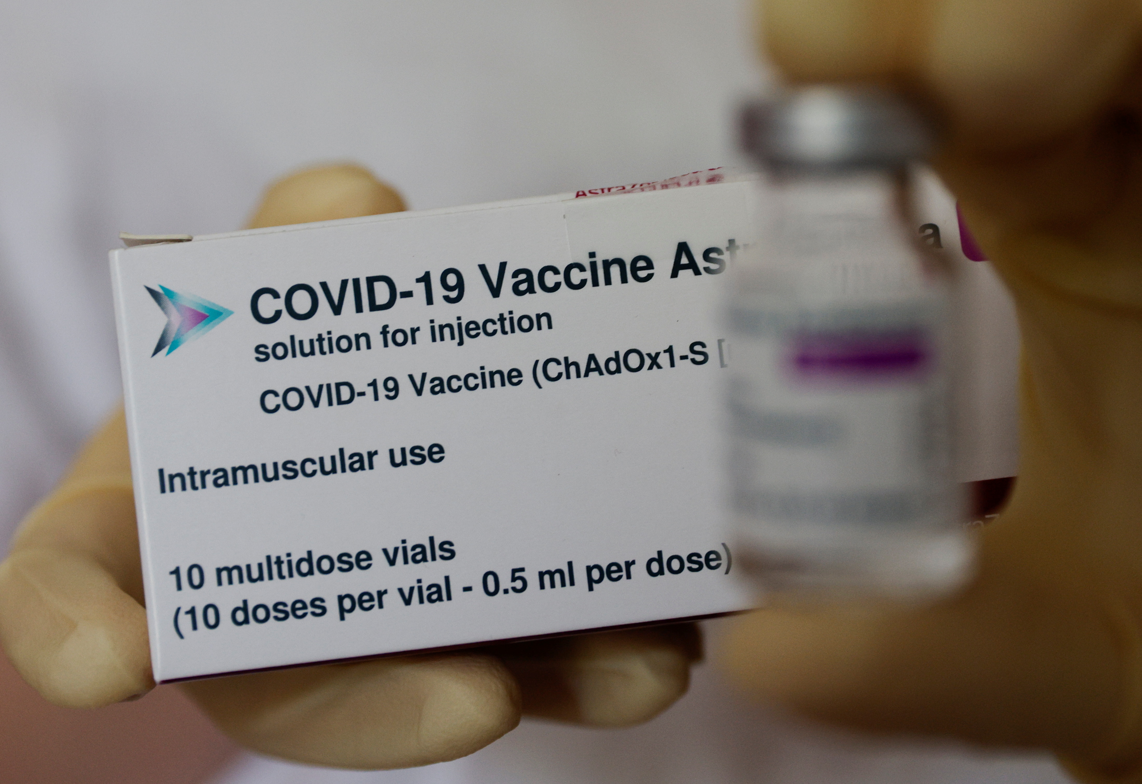 A box and a vial of AstraZeneca's COVID-19 vaccine are seen in Vienna