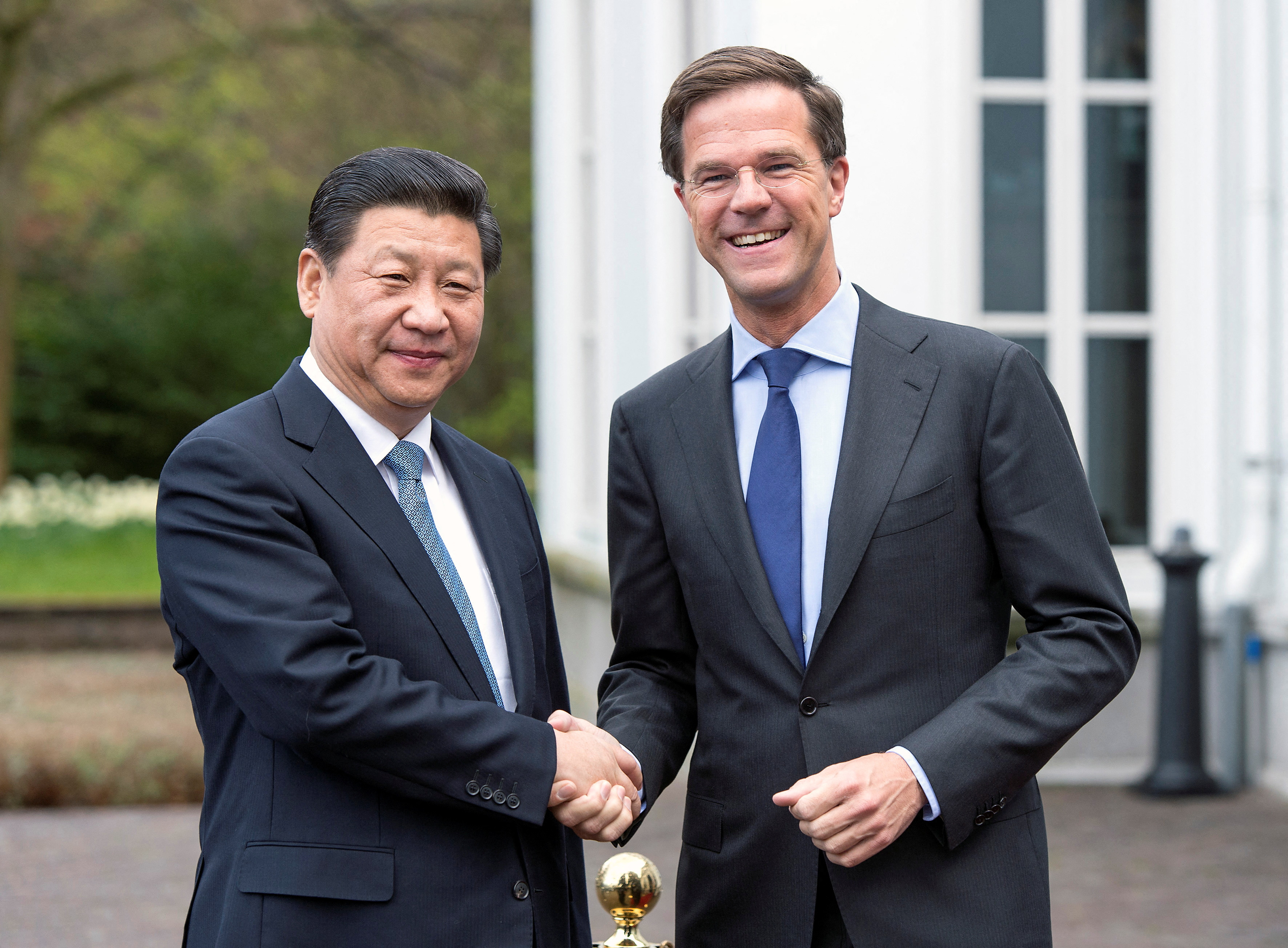 Prime Minister Mark Rutte of the Netherlands welcomes China's President Xi Jinping on the second day of his state visit, at The Hague