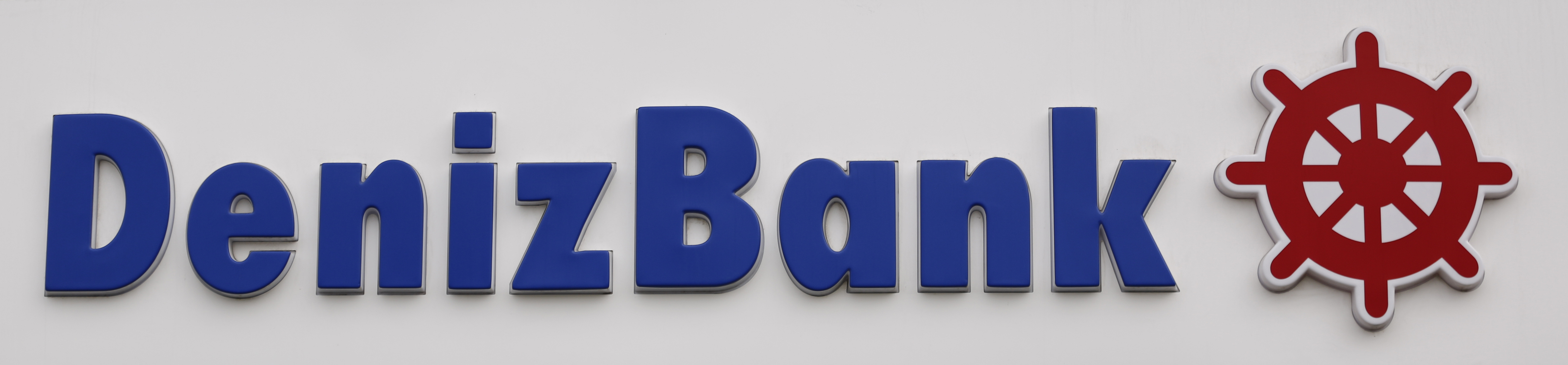 The logo of Turkey's Denizbank is seen at the company's headquarters in Istanbul